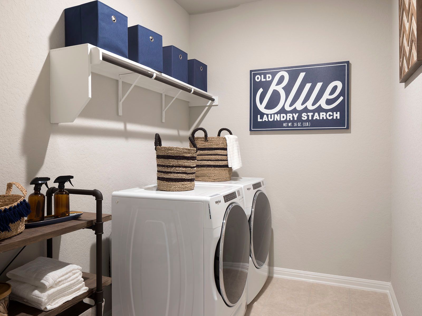 The spacious laundry room provides lots of space for all your cleaning needs.:The spacious laundry room provides lots of space for all your cleaning needs.
