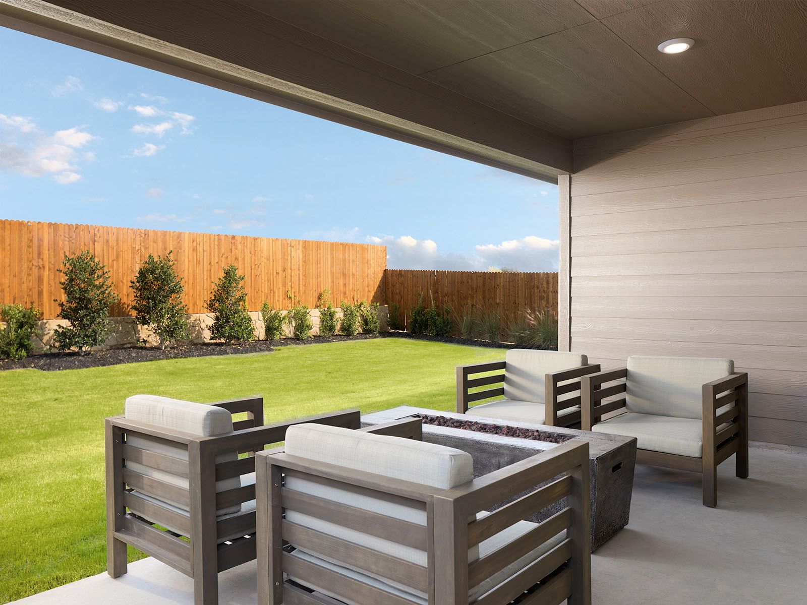 Sip your morning coffee on the covered outdoor patio.:Sip your morning coffee on the covered outdoor patio.