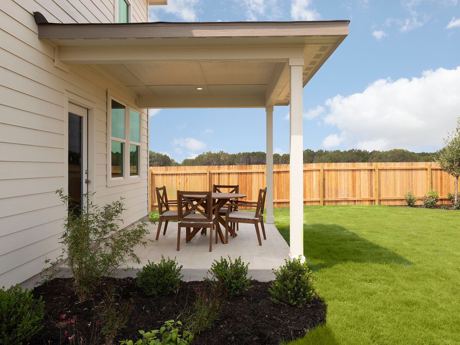 Spend sunny afternoons outside in the backyard.:Spend sunny afternoons outside in the backyard.
