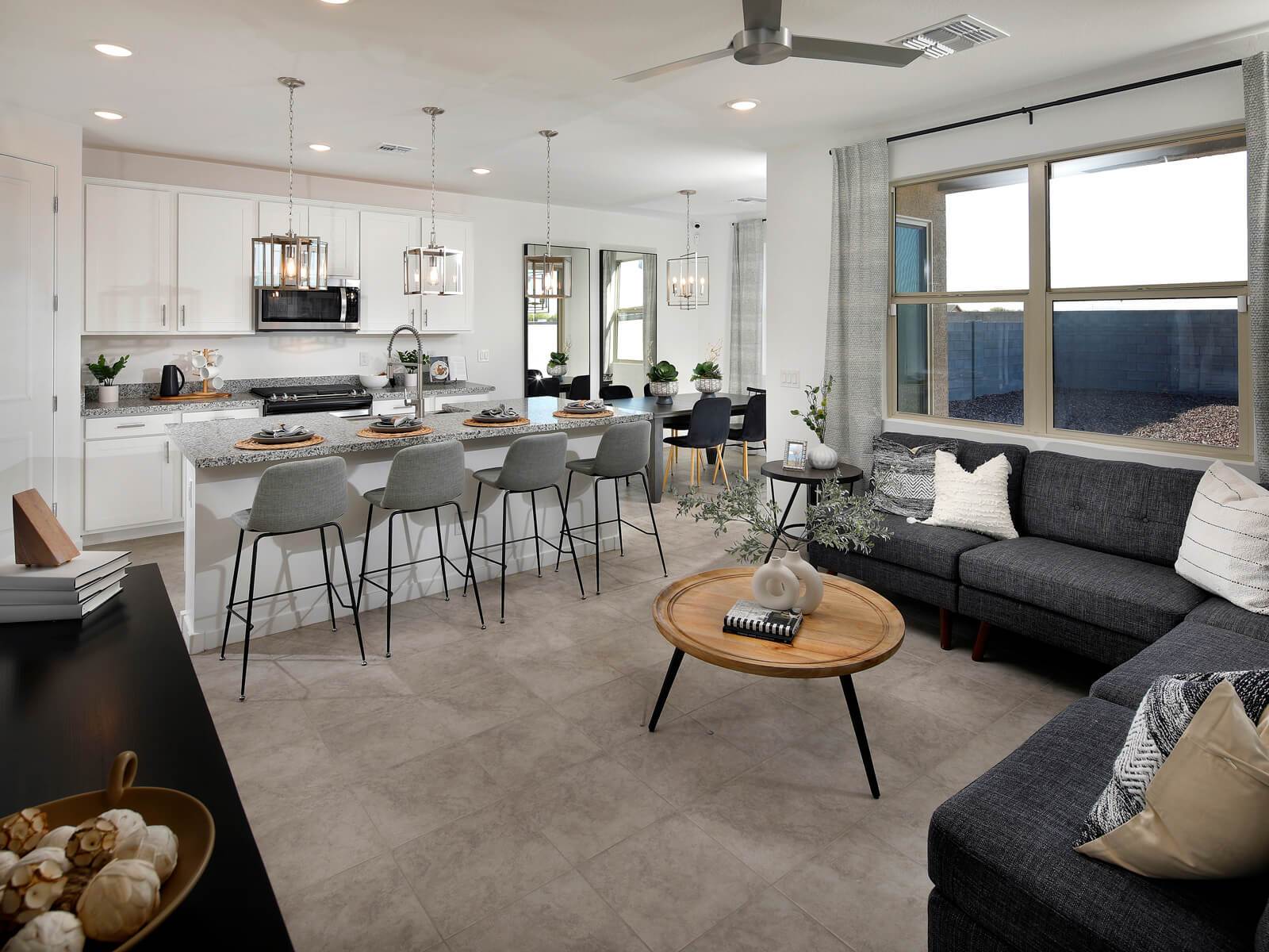 Living Area:Kitchen in Carson floorplan modeled at The Enclave on Olive.