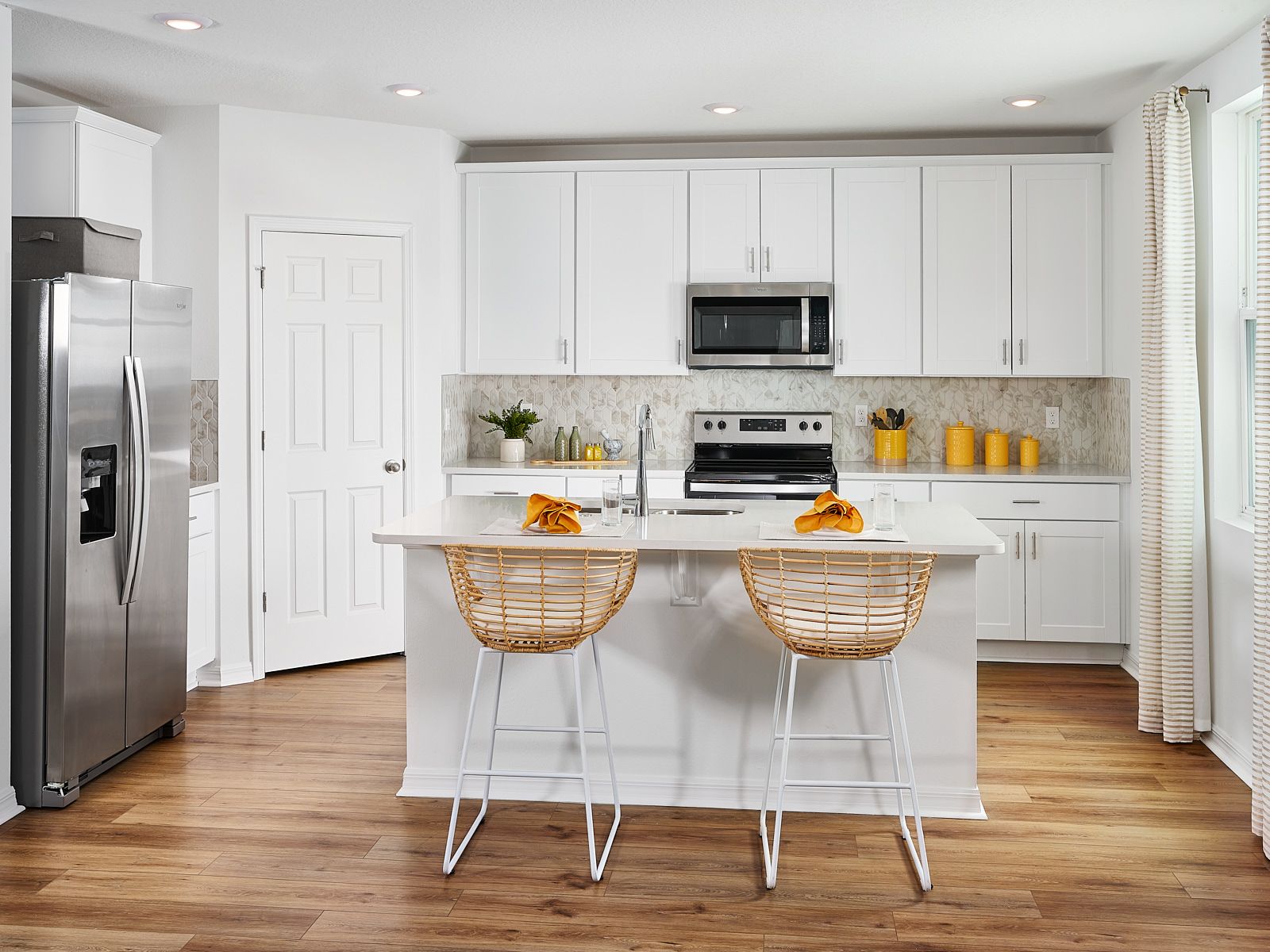 Kitchen modeled at The Meadow at Crossprairie:Kitchen modeled at The Meadow at Crossprairie