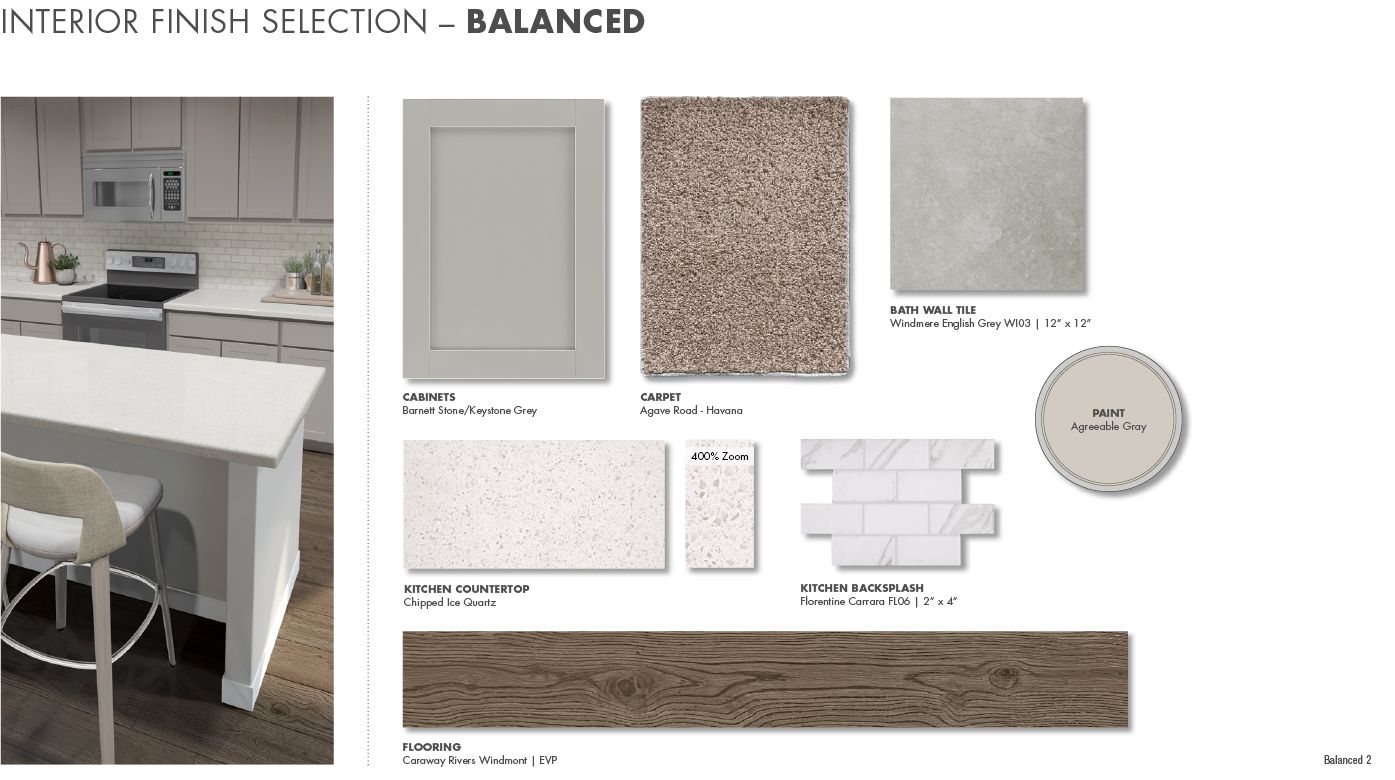 Balanced Interior Package:Light grey colored cabinets and quartz countertops