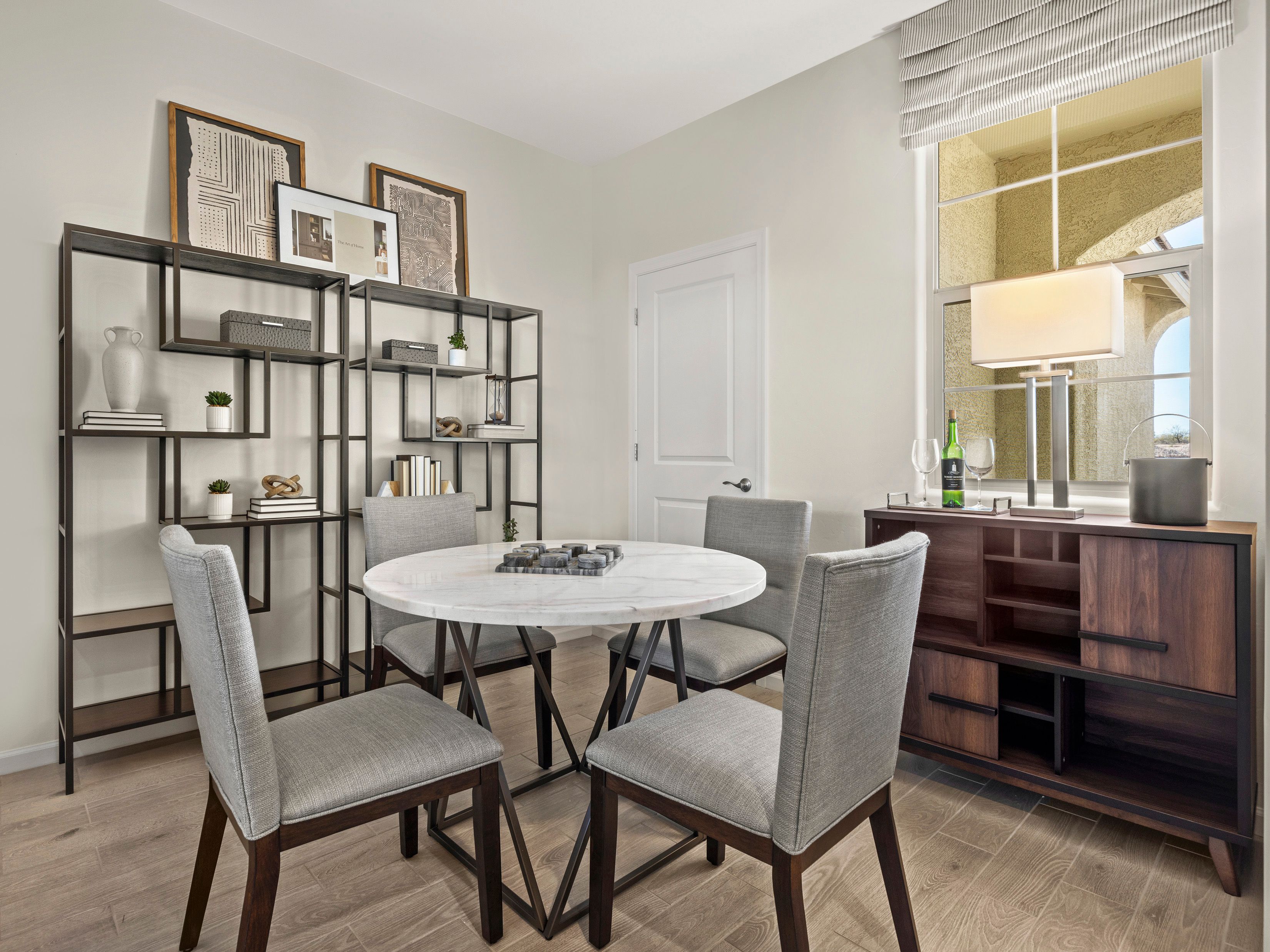 Convert the den into an office for work-from-home space.:Convert the den into an office for work-from-home space.