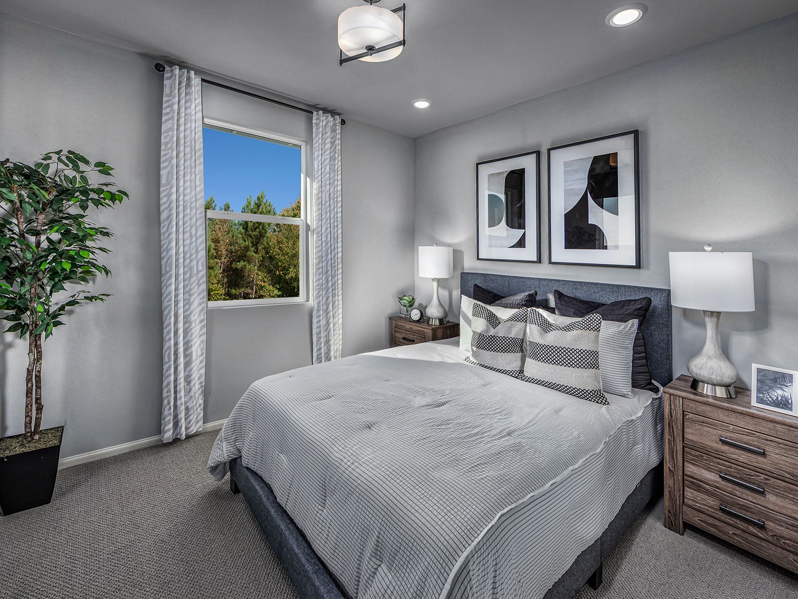 Bedroom:Residence 2 interior image modeled at a nearby Meritage community.