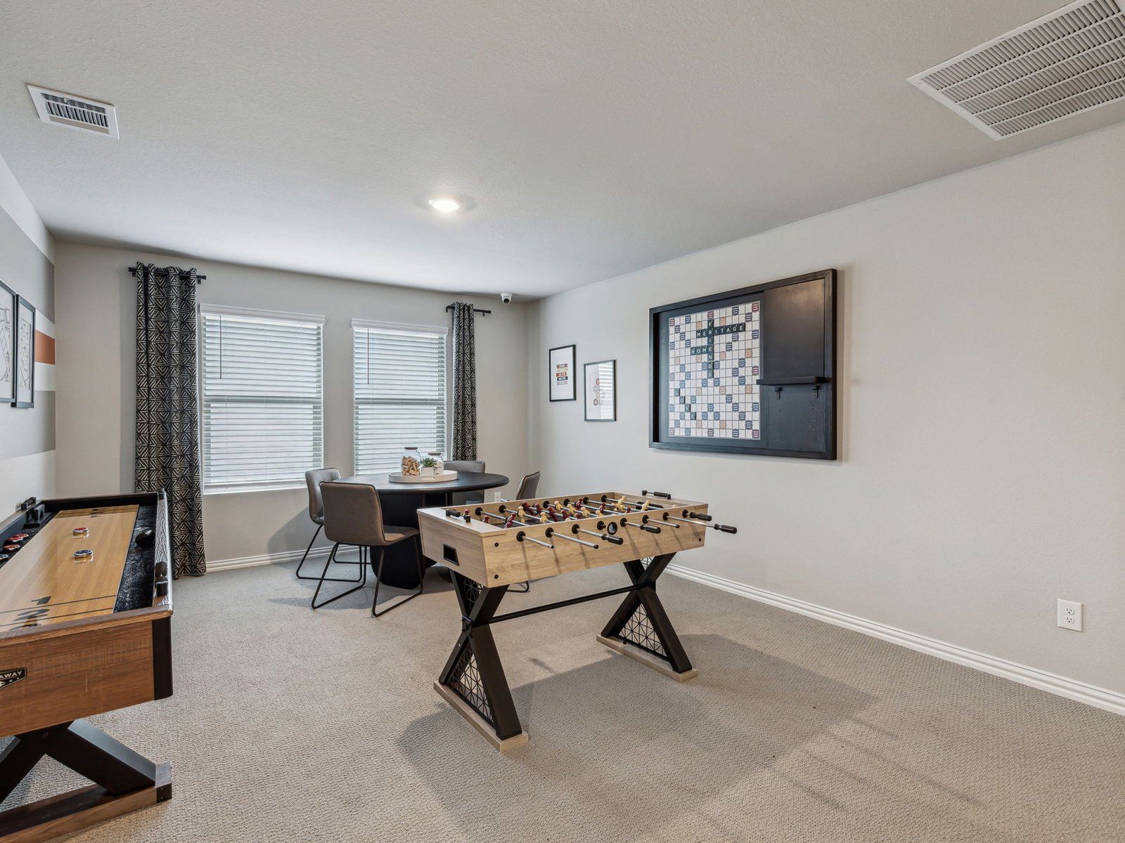 Game night, move night, or homework time, this upstairs gathering area is perfect for all:Game Room