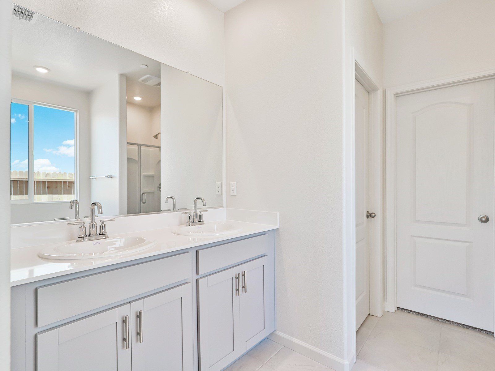 Residence 1 primary bathroom at a nearby Meritage community.:Residence 1 primary bathroom at a nearby Meritage community.