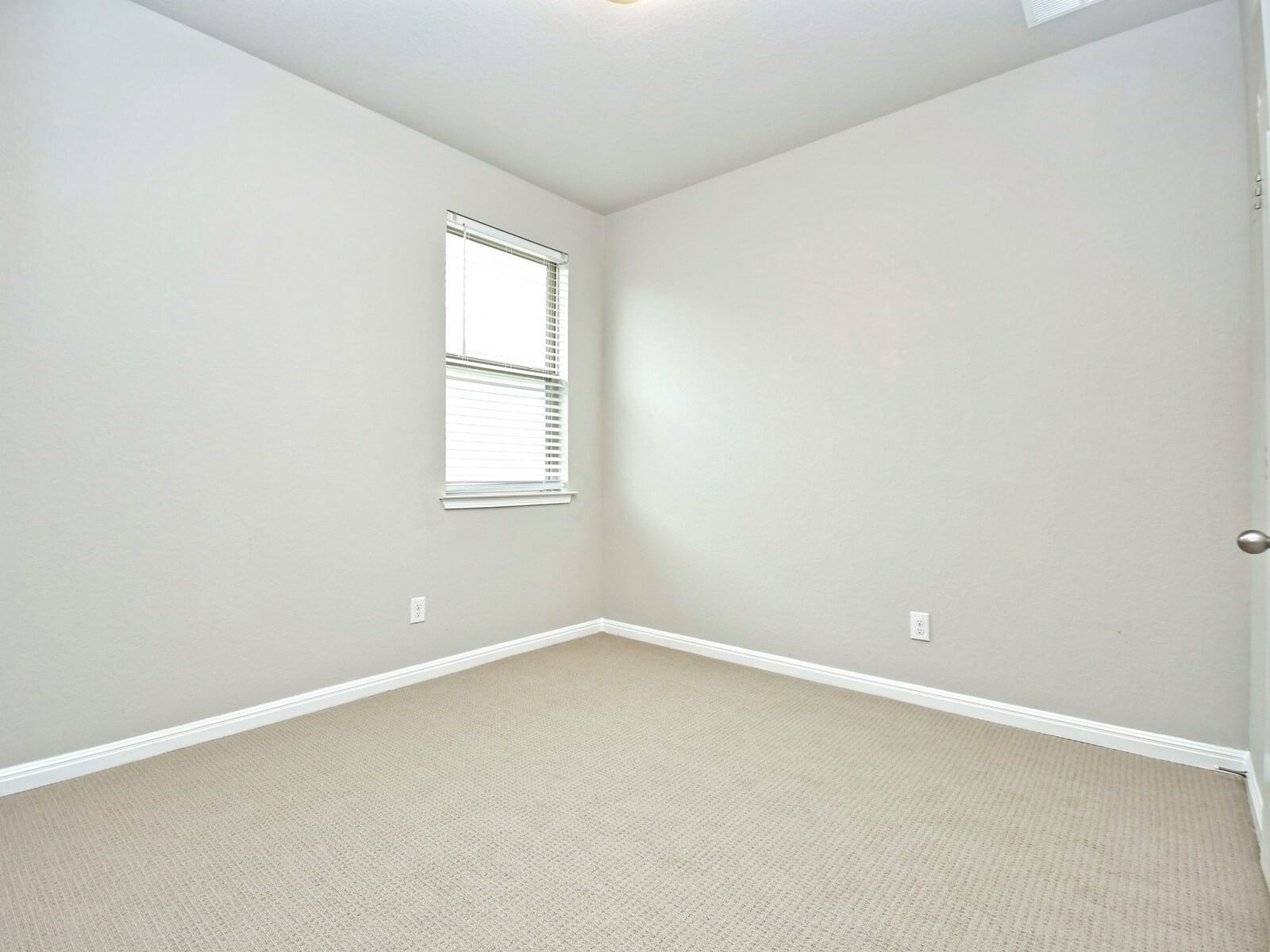 Guest bedroom in the San Saba floorplan at a Meritage Homes community.:Guest bedroom in the San Saba floorplan at a Meritage Homes community.