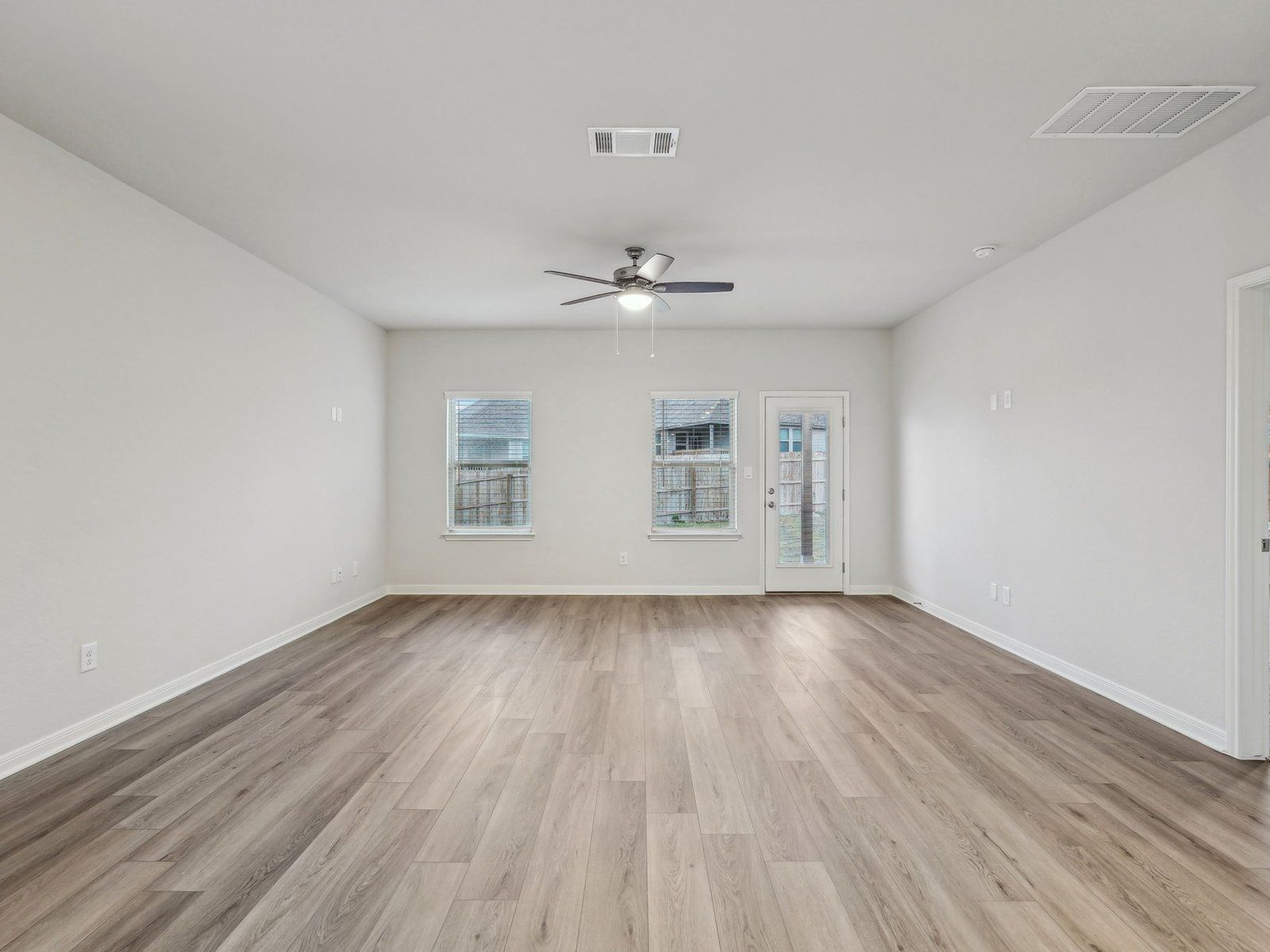 Arcadia Ridge:Living room in the Reynolds floorplan at a Meritage Homes community.