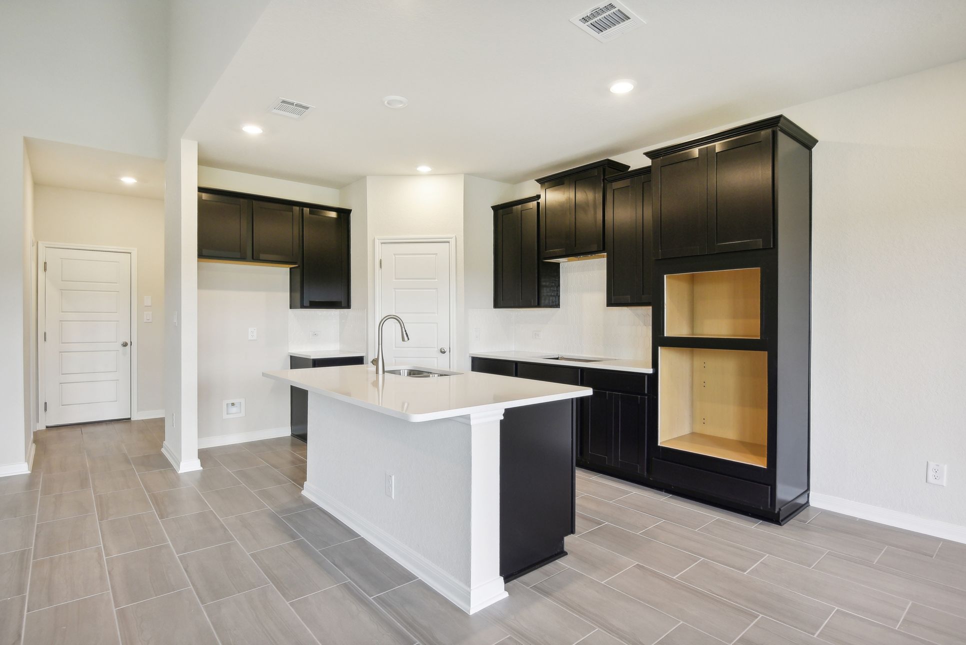 Kitchen in the McKinnon floorplan at a Meritage Homes community.:Kitchen