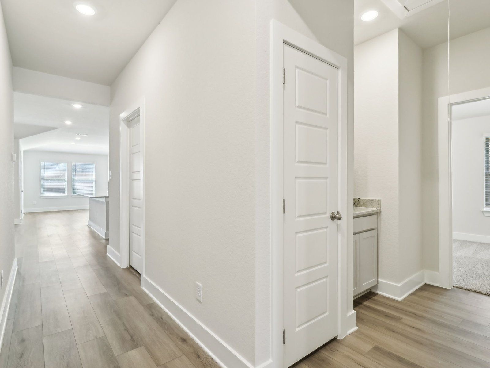 Hallway in the Callaghan floorplan at a Meritage Homes community.:Hallway