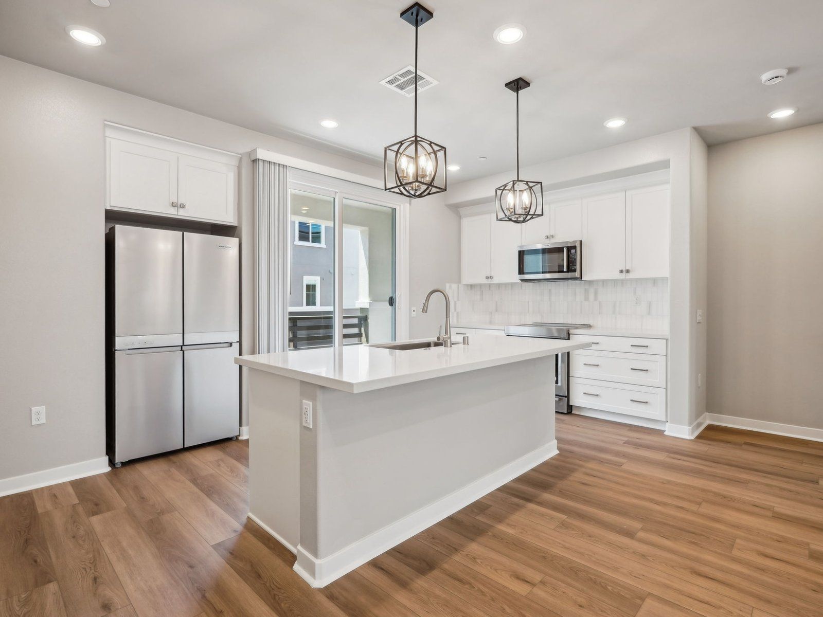 2133 floorplan interior image taken at a Meritage Homes community in San Pedro, CA.:Kitchen