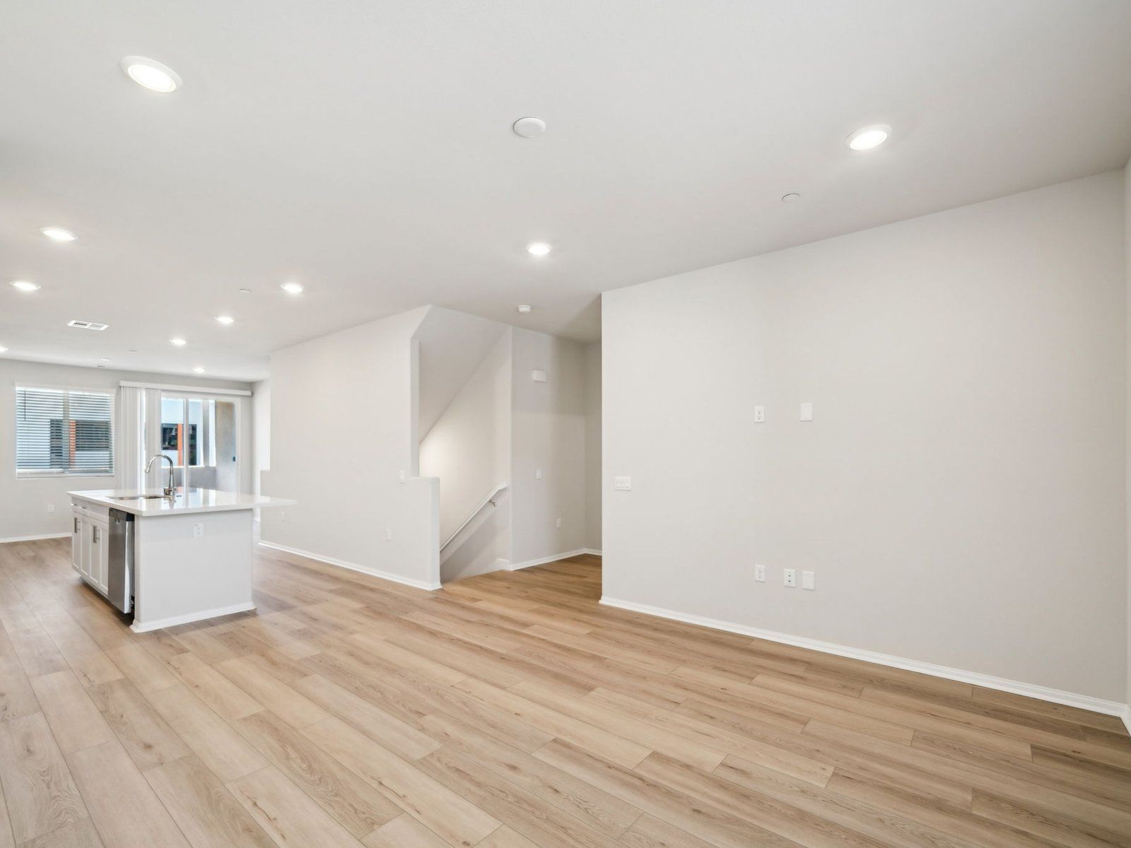Great Room:1637 floorplan interior image taken at a Meritage Homes community in Pomona, CA.