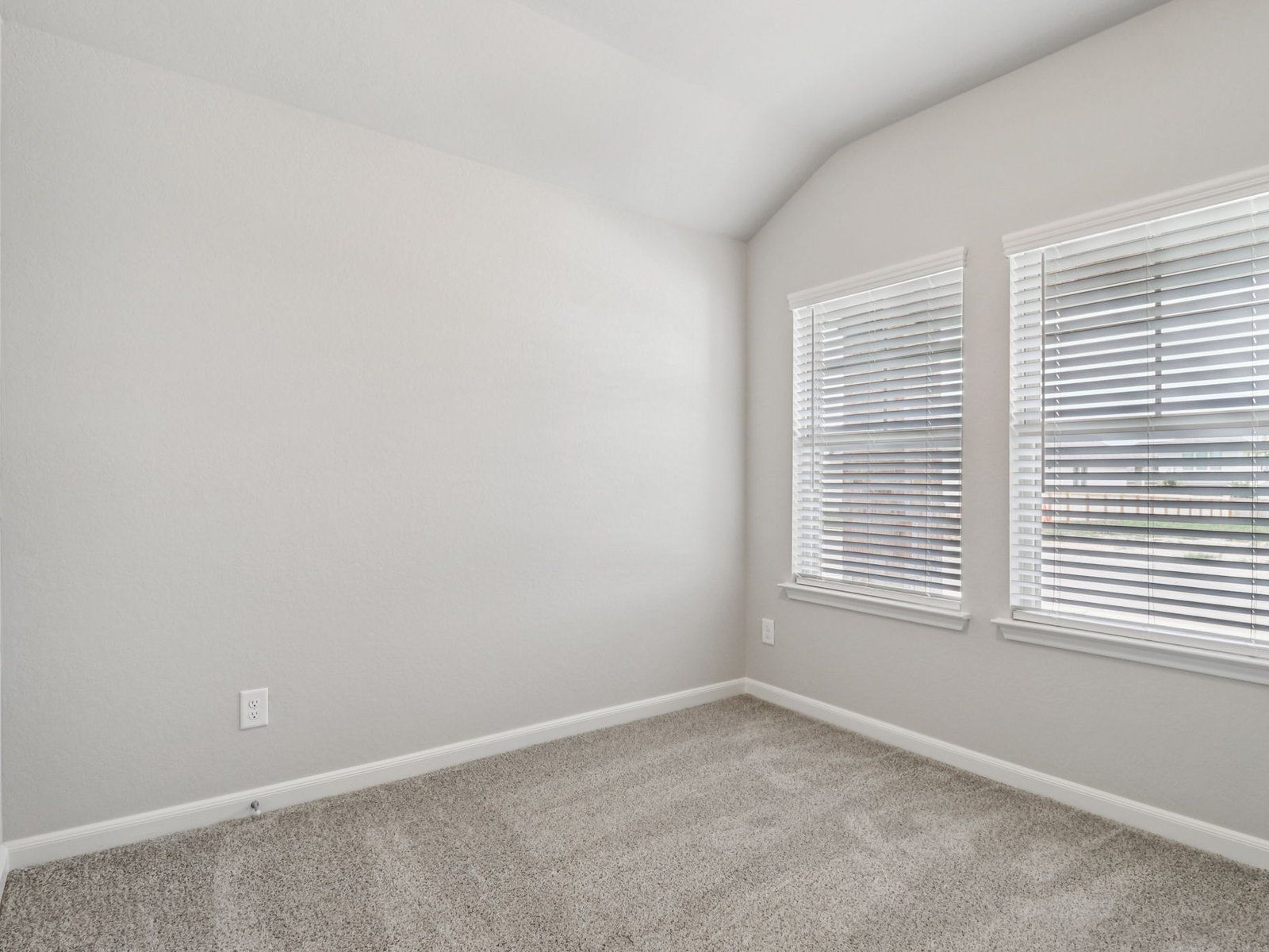 Guest bedroom in the Callaghan floorplan at a Meritage Homes community.:Guest Bedroom