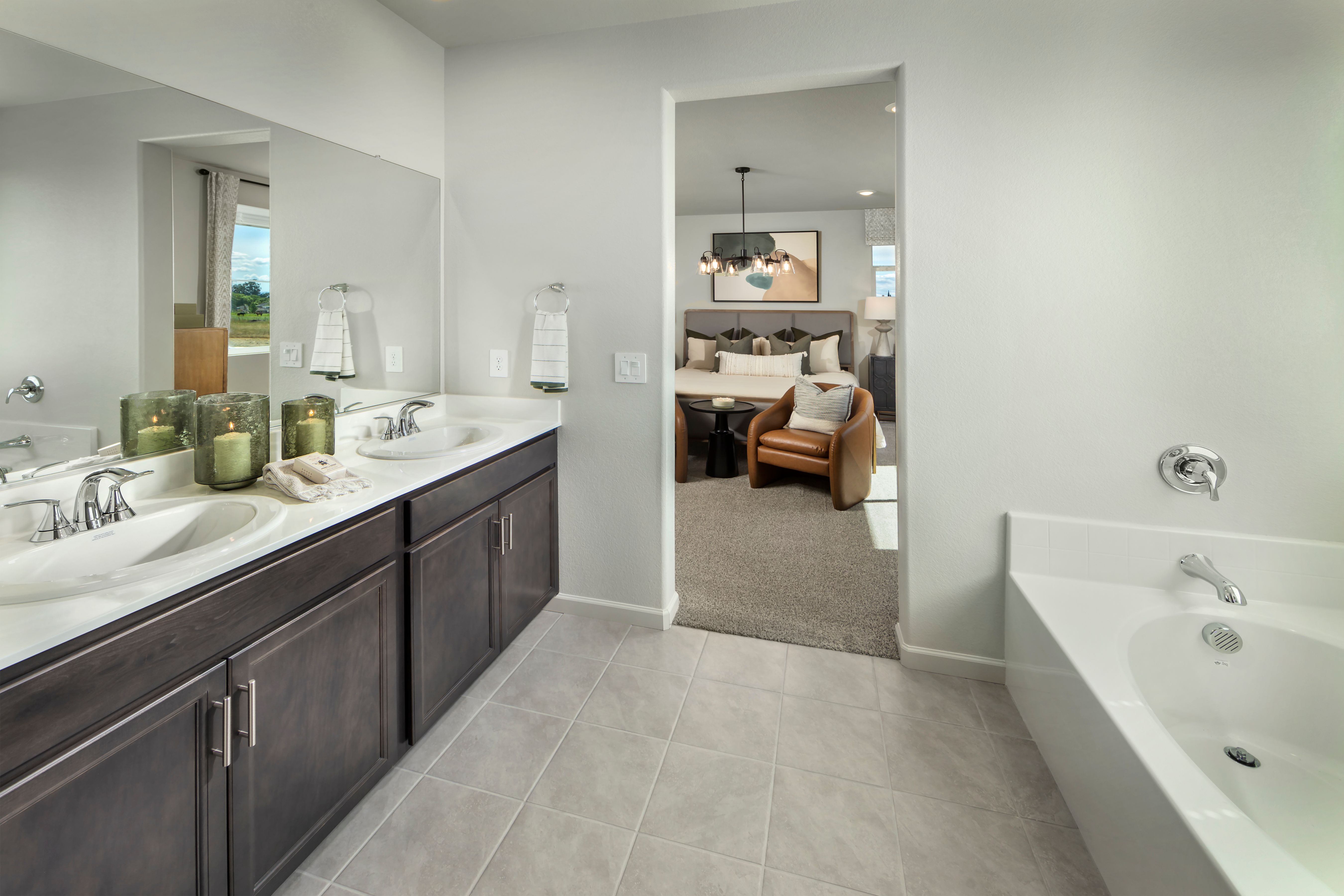 NCA_ASPEN_PLAN_5_PRIMARY_BATHROOM.jpg:Modeled Residence 5 of Aspen at Villa Ticino in Manteca, CA.