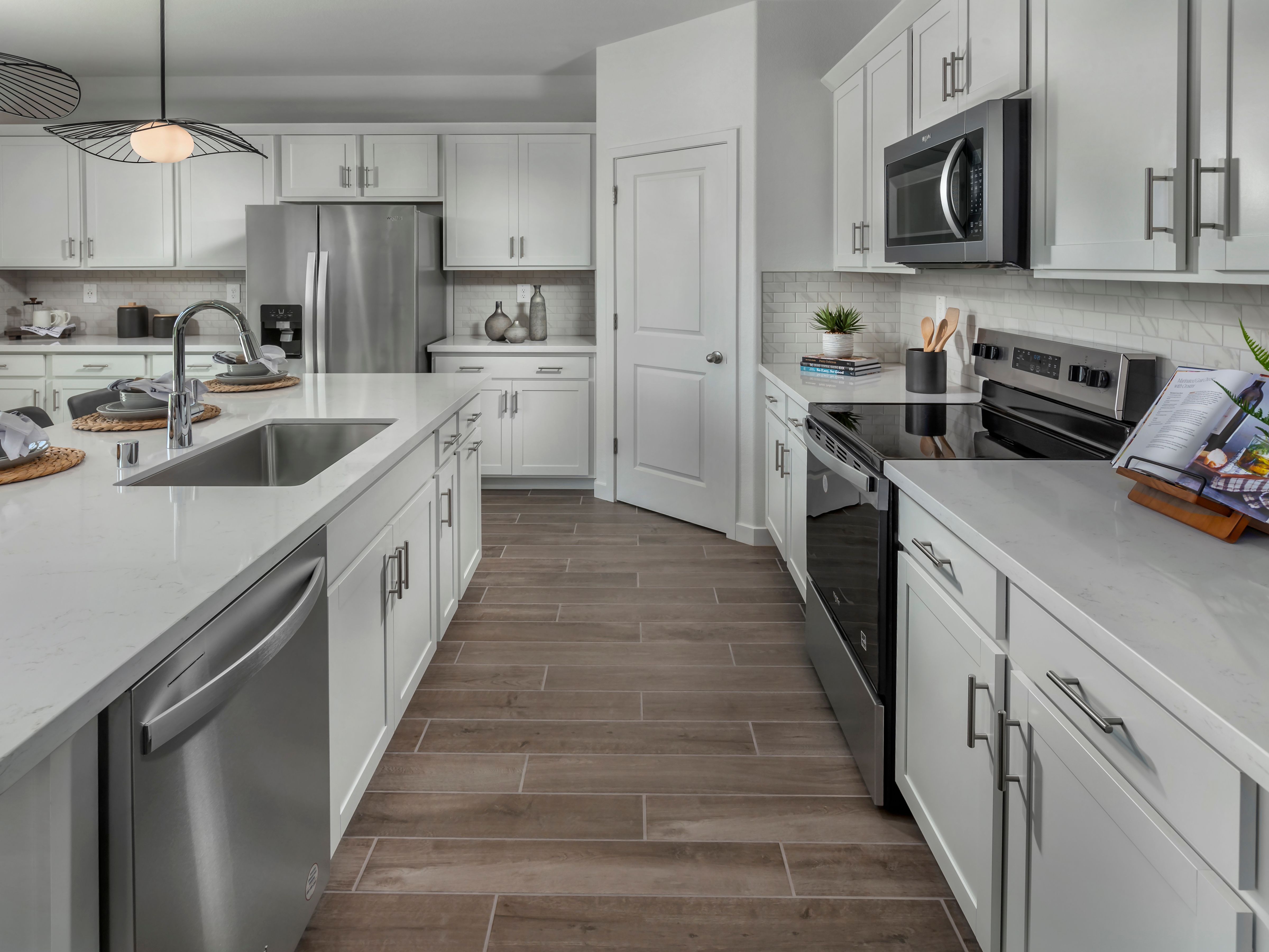 NCA_LIBERTY_RANCH_PLAN_3_KITCHEN_VIEW_2.jpg:Modeled Residence 3 from Vernon at Liberty Ranch in Galt, CA.