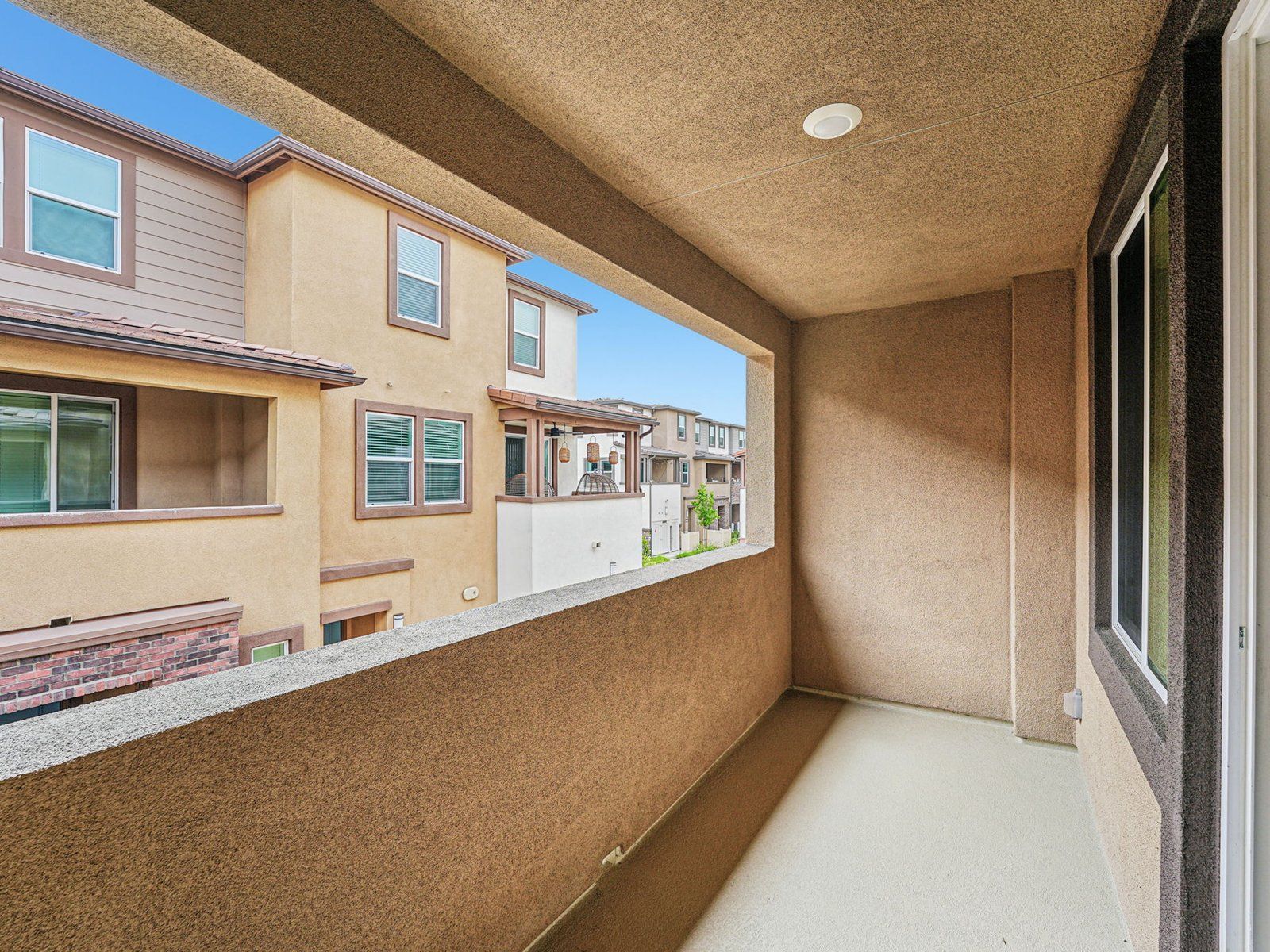 1633 floorplan exterior image taken at a Meritage Homes community in Pomona, CA.:Balcony