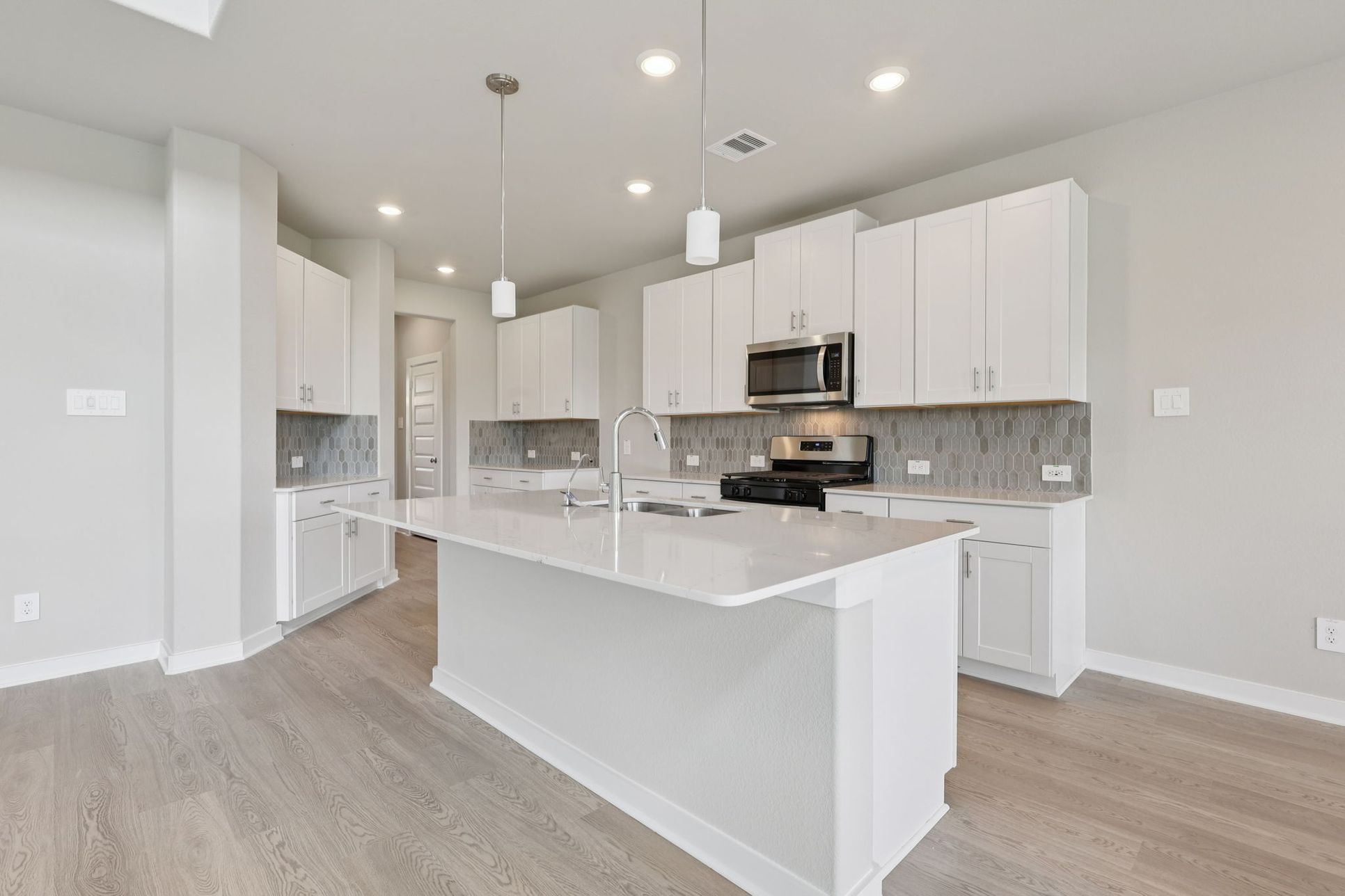 The Cedar floorplan in Kingdom Heights of Rosenberg, TX.:Kitchen