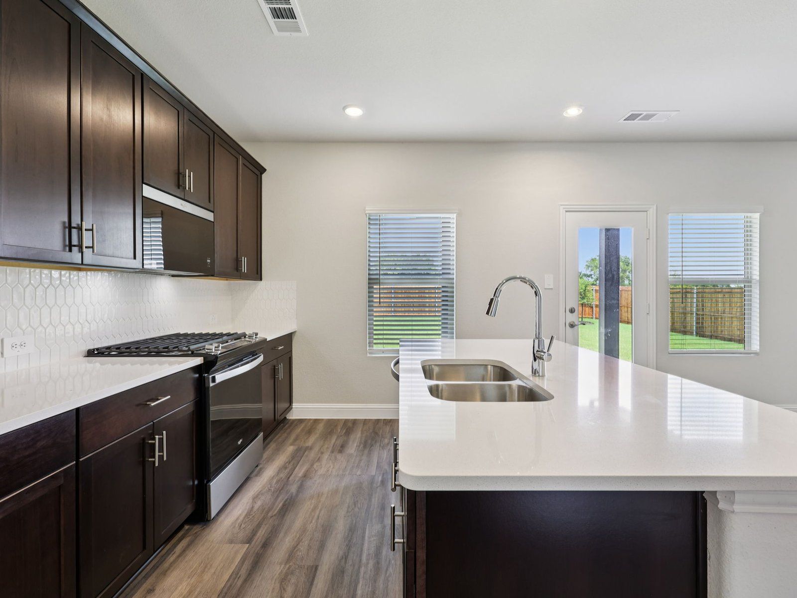 The McCoy floorplan with the Distinct 2 interior package.:Kitchen