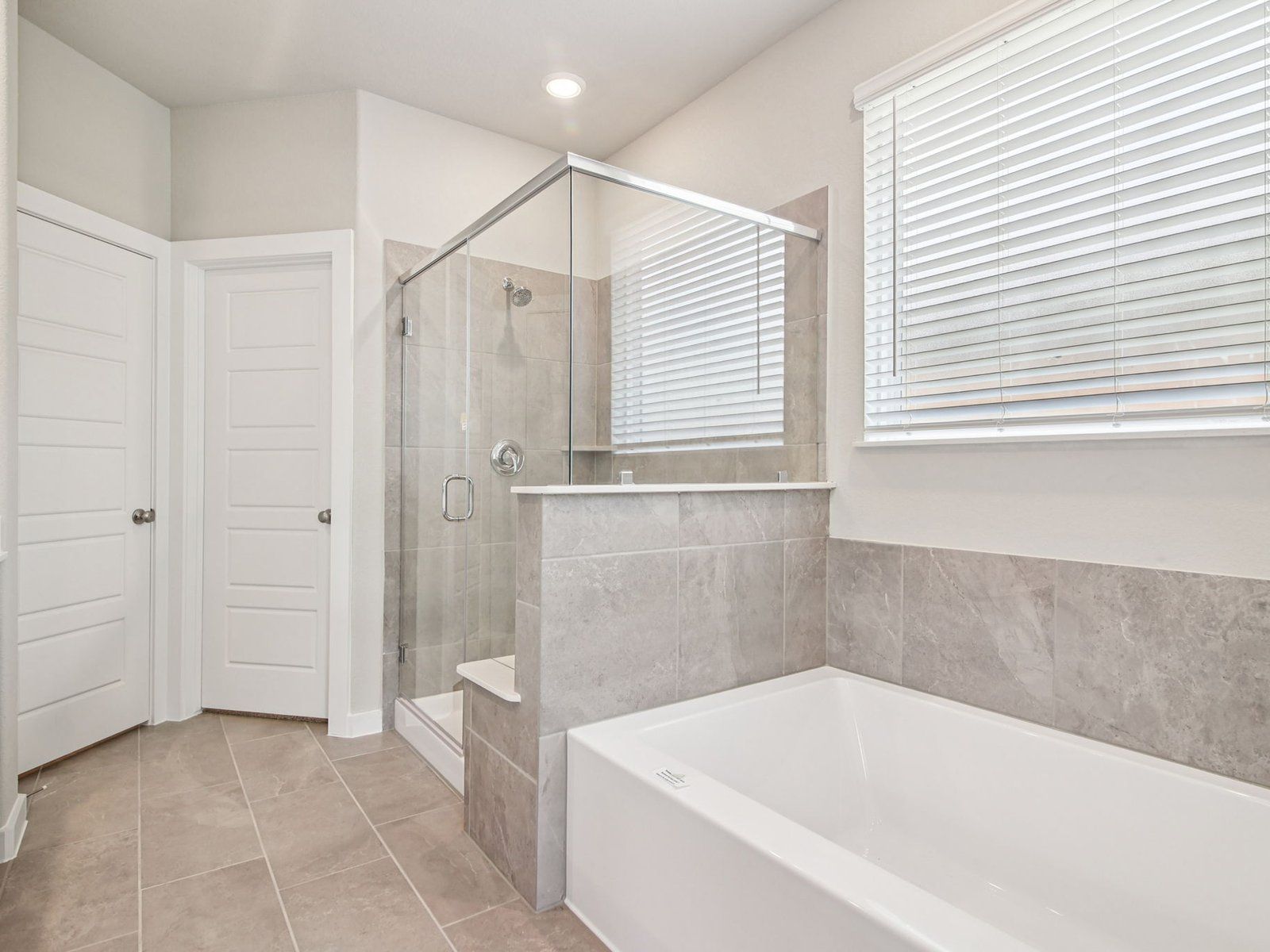The Somerville floorplan in Pine Lake Cove of Montgomery, TX.:Primary Bathroom