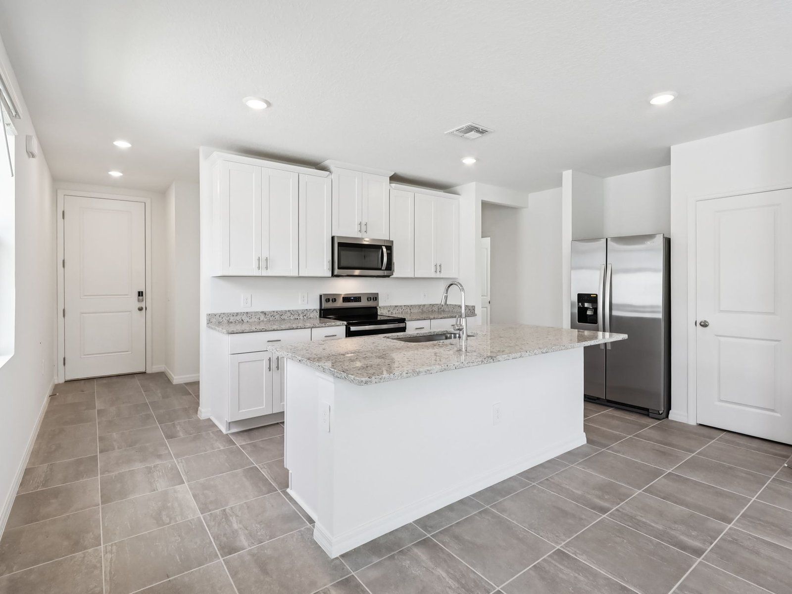 The Acadia floorplan at 1125 Cumberland Trail Drive.:Kitchen