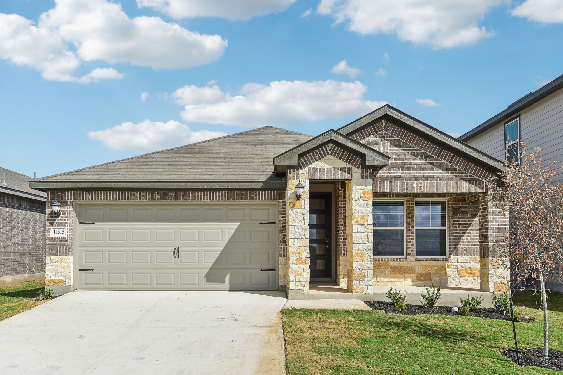 Front Exterior:Front exterior of the Callaghan floorplan at a Meritage Homes community.