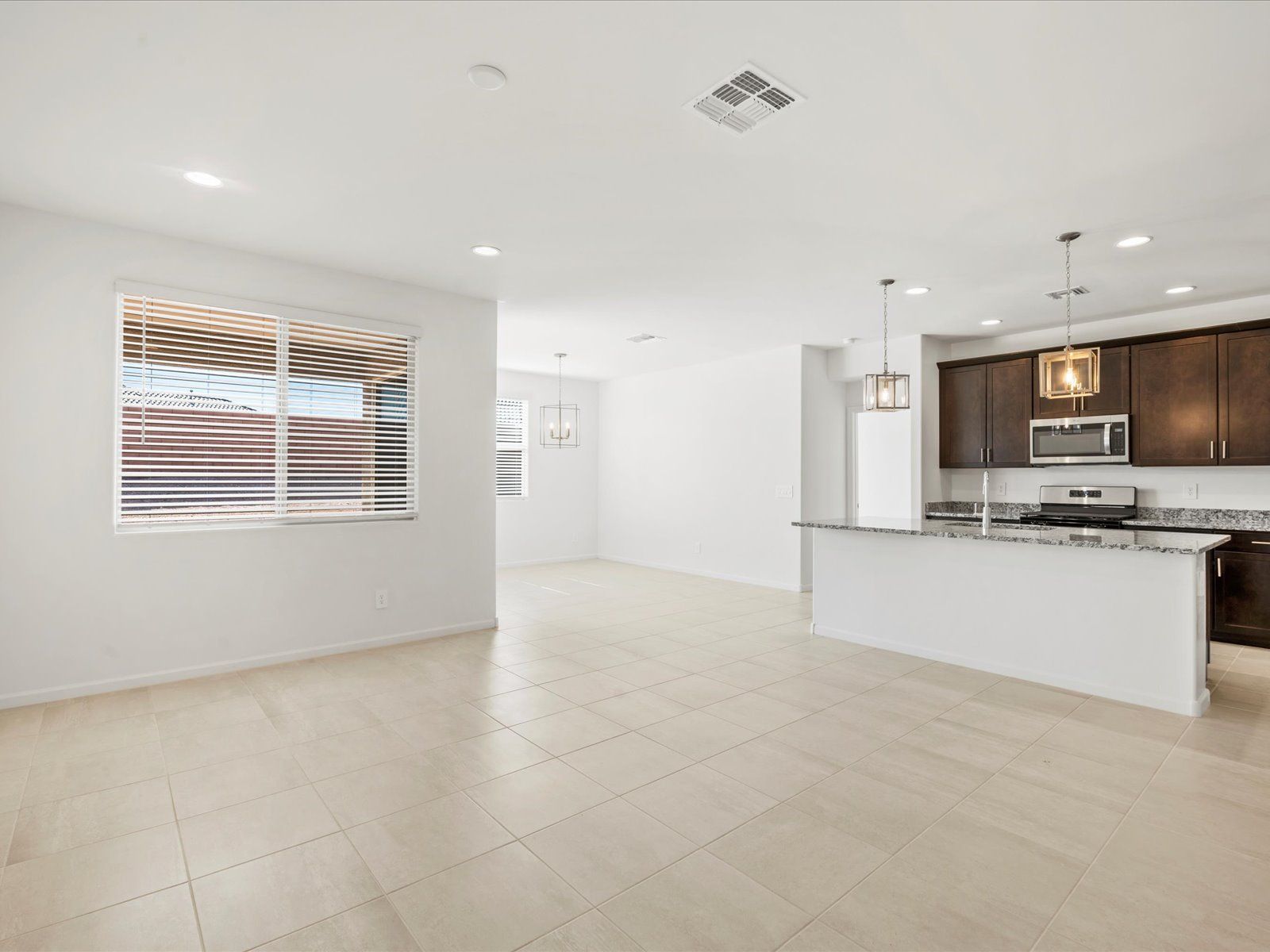 Welcome to the 1820 floorplan image taken at Alamar at Rocking K in Vail, AZ.:TUC_Rocking-K_1820-A_Kitchen_8329-S-Clara-Roberts-Wy