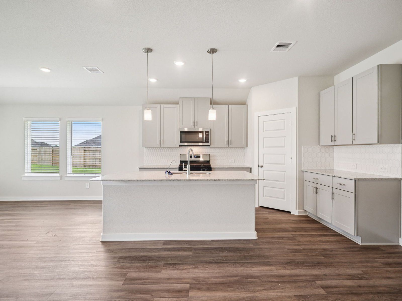 The Preston floorplan in Massey Oaks of Pearland, TX.:Kitchen