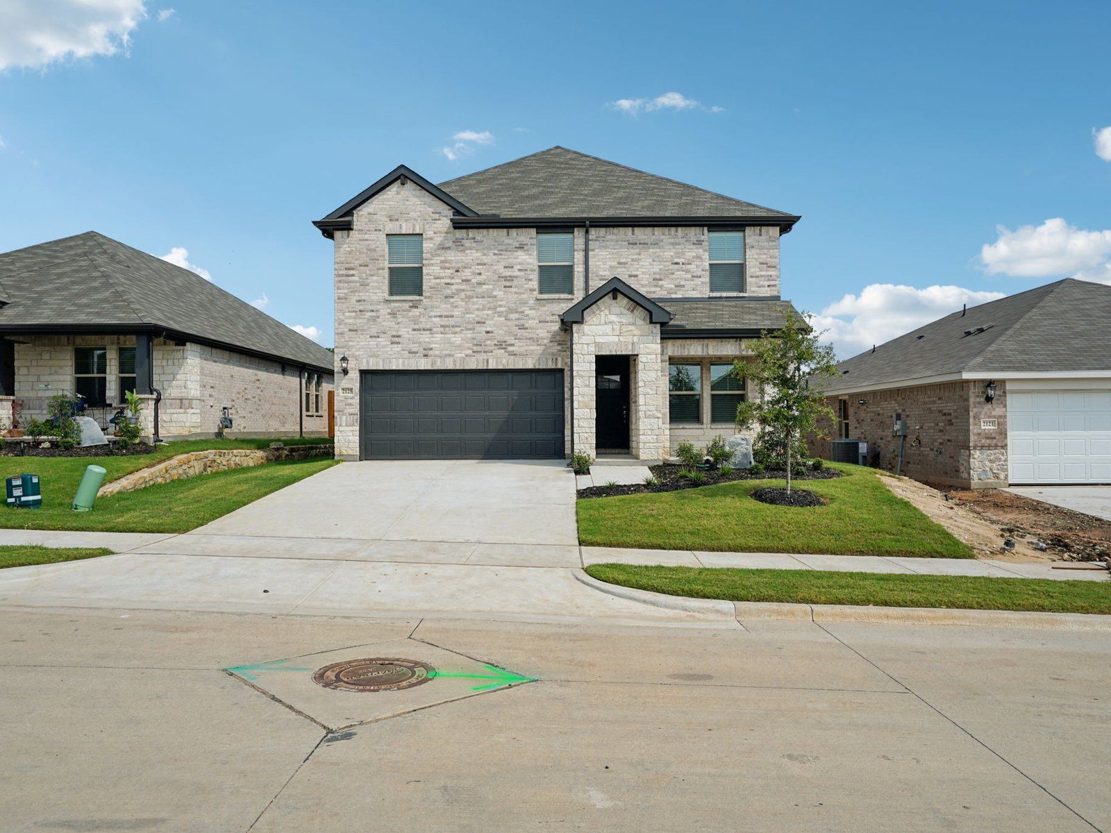 The McCoy floorplan with the Elemental 2 interior package:Front Exterior