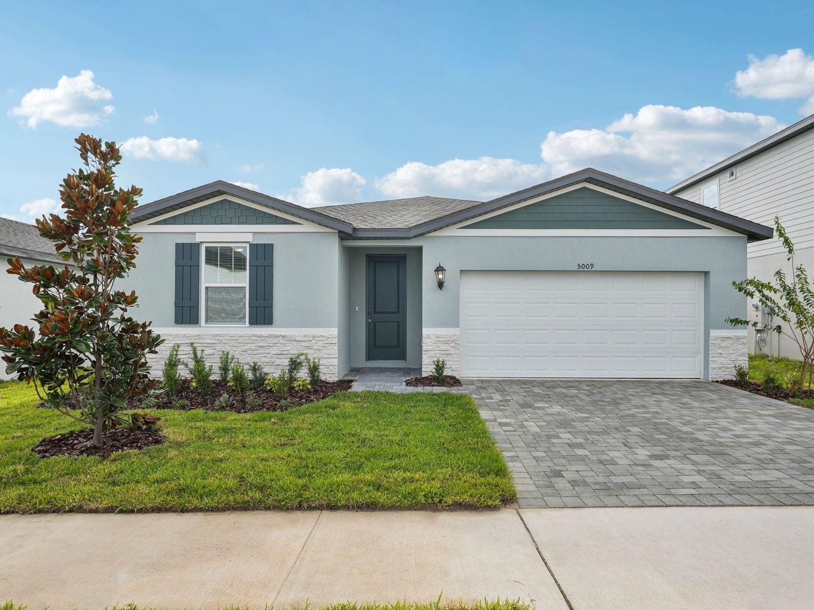 The Foxglove floorplan at 5009 Katrina Drive.:Front Exterior