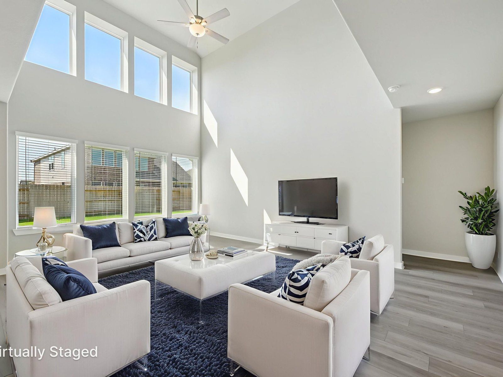 Living Room:The Cedar floorplan in Kingdom Heights of Rosenberg, TX.