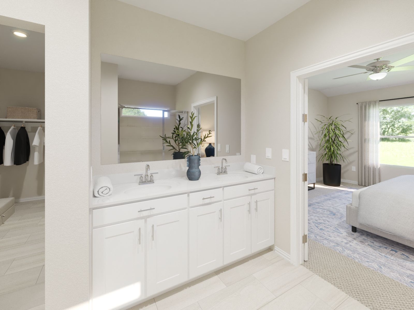 Primary Bathroom:Primary bathroom with double vanity and large walk-in closet