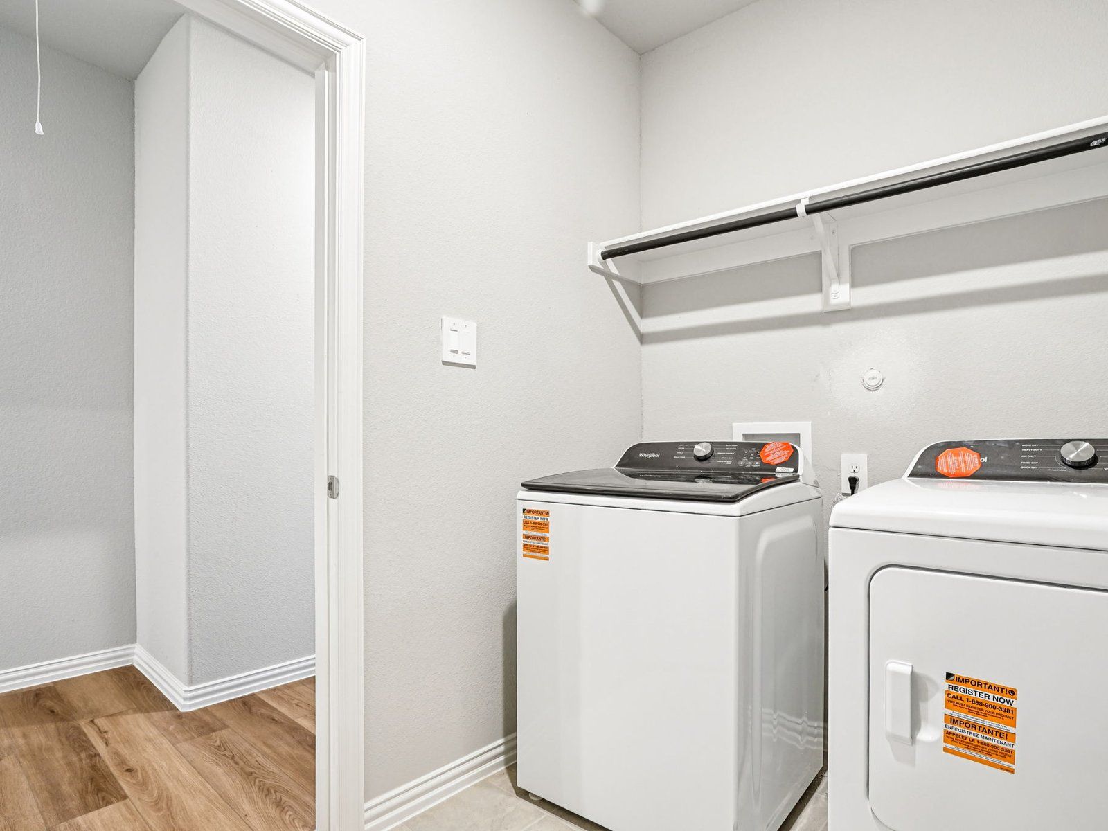 The Independence floorplan with the Refined 1 interior package.:Laundry Room