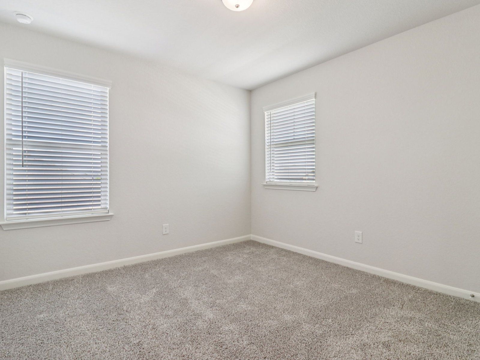 Guest bedroom in the Matadoor floorplan at a Meritage Homes community.:Guest Bedroom