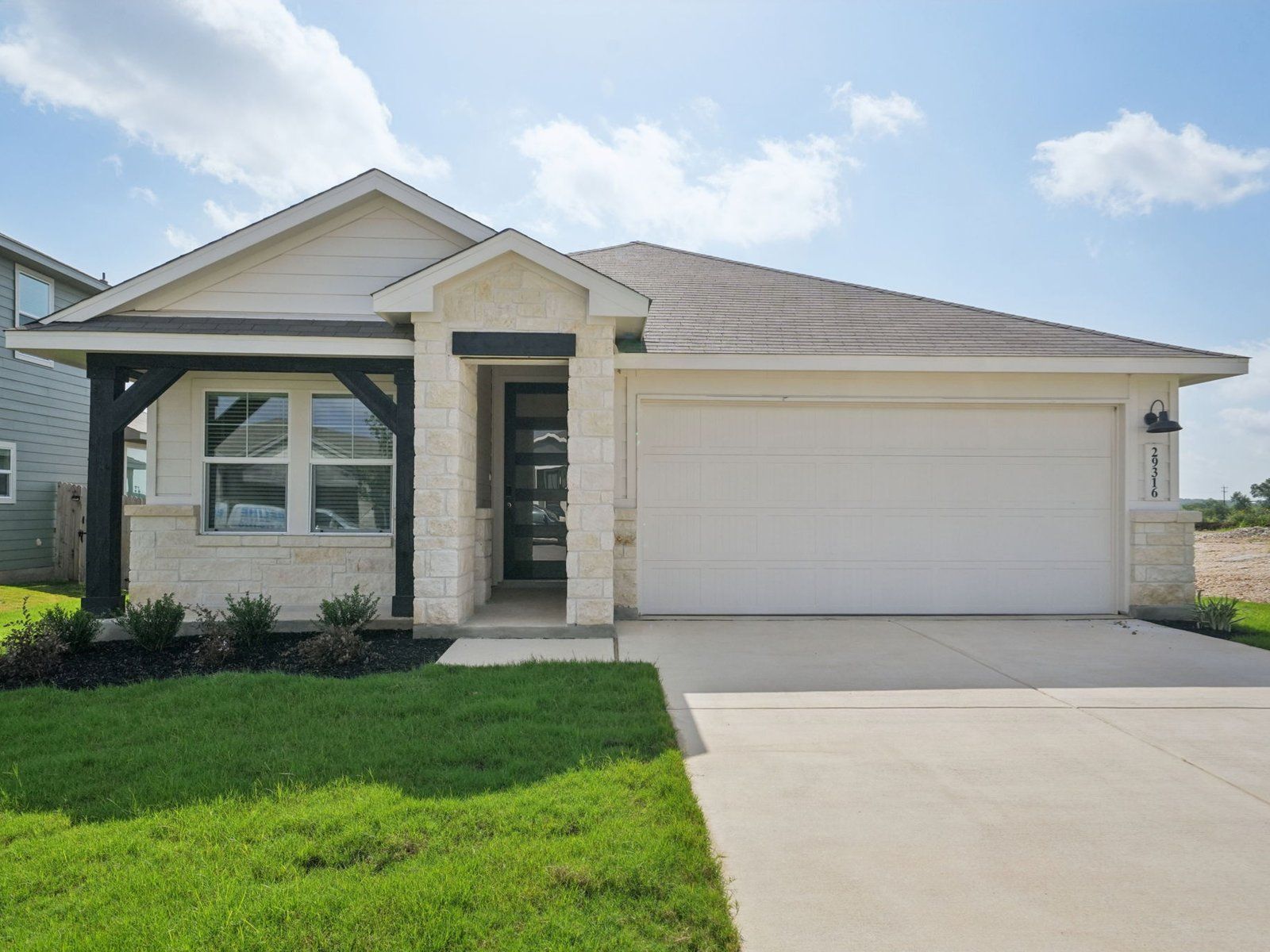 Front exterior of the Allen floorplan at a Meritage Homes community.:Front Exterior