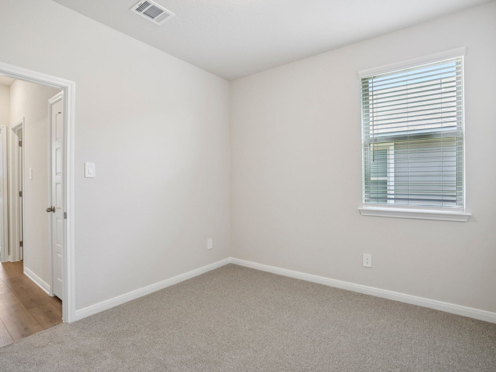 Guest bedroom in the Rio Grande floorplan at a Meritage Homes community.:Guest Bedroom