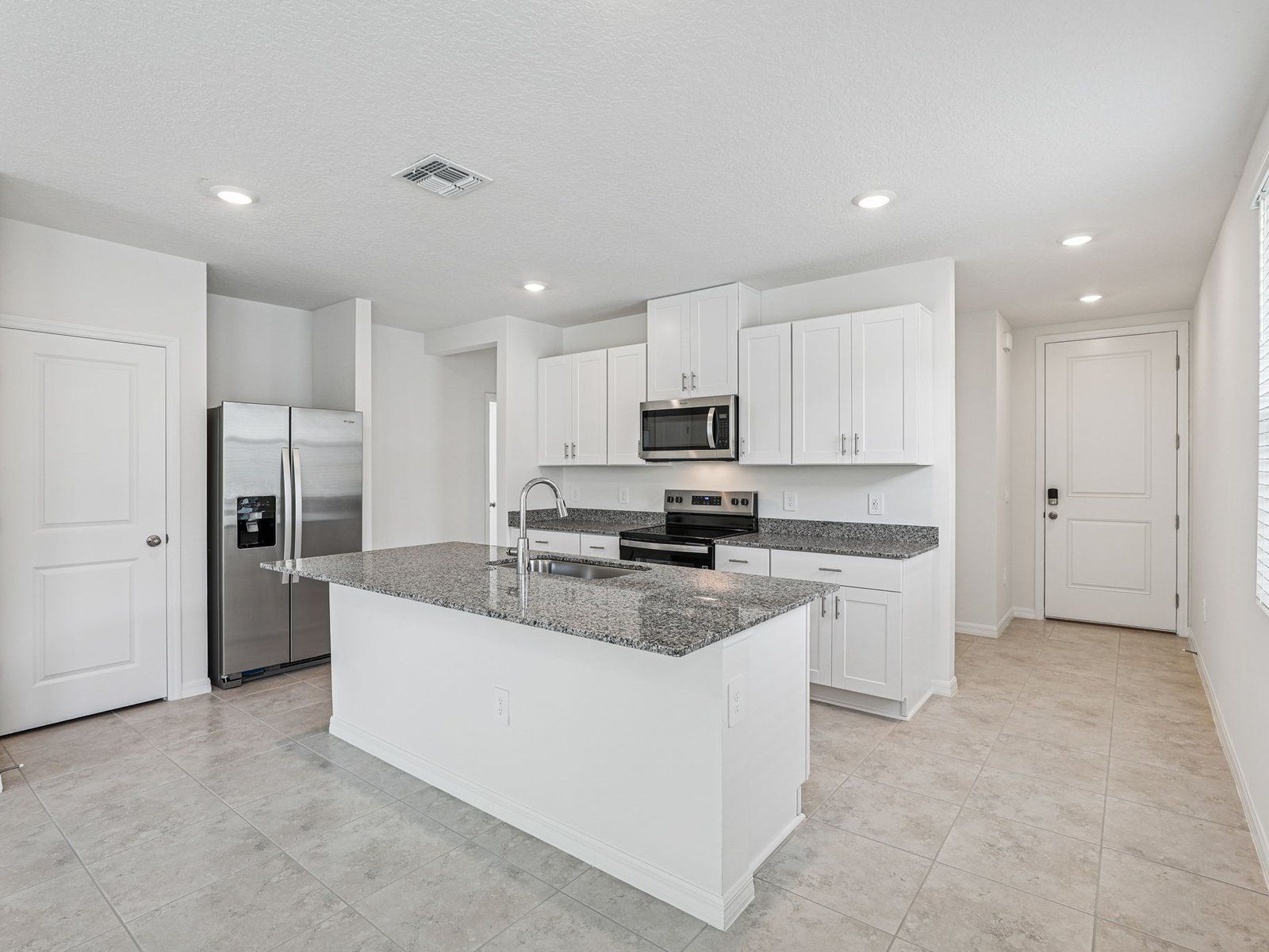 The Acadia floorplan at 727 Trailhead Point Dr:Kitchen