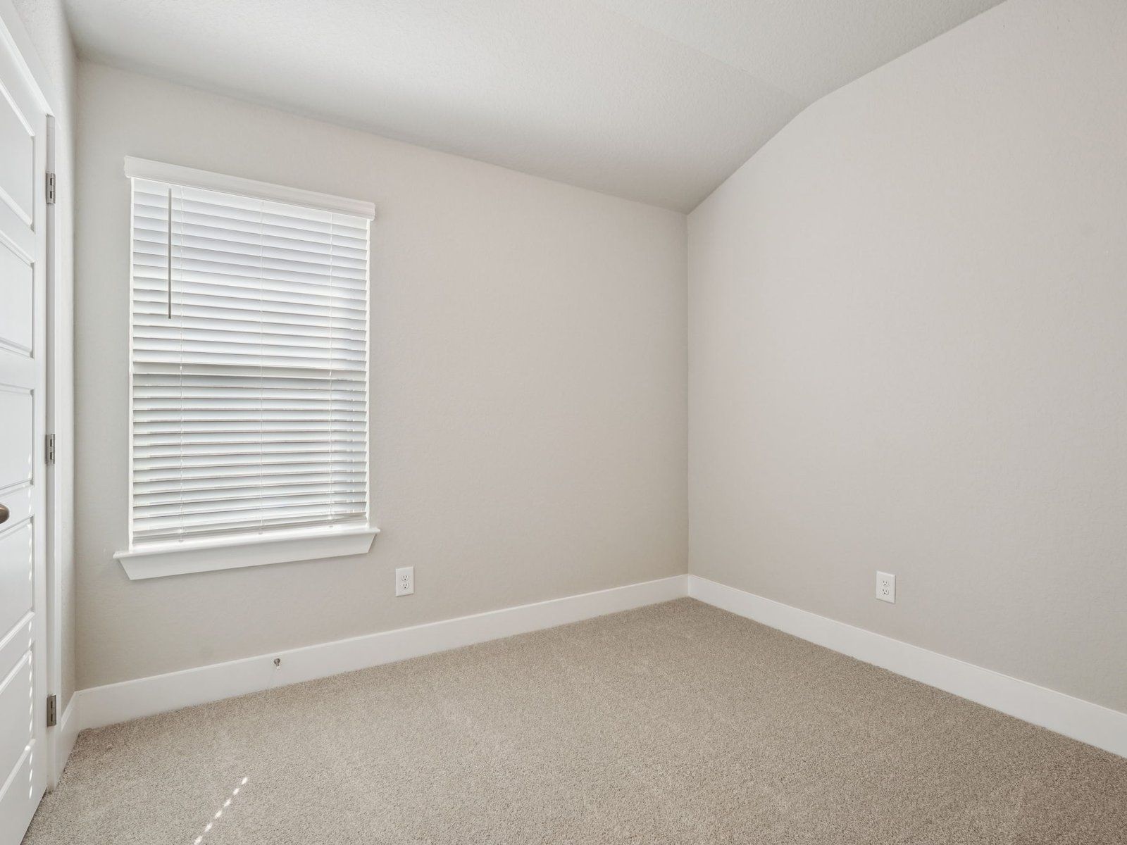 Guest bedroom in the Callaghan floorplan at a Meritage Homes community.:Guest Bedroom