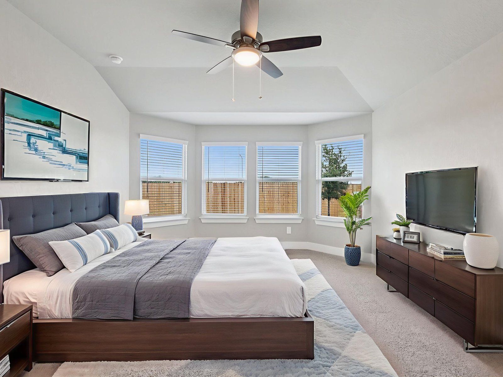 Virtually staged primary suite in the Callaghan floorplan at a Meritage Homes community.:Virtually Staged Primary Suite