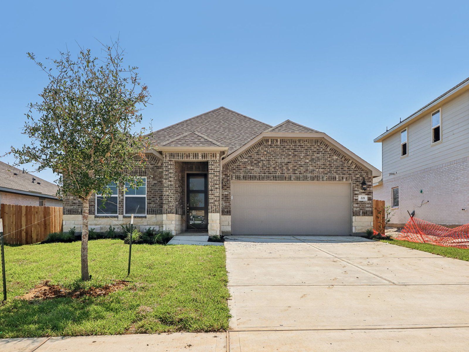The Oleander floorplan in Pine Lake Cove of Montgomery, TX.:Front Exterior