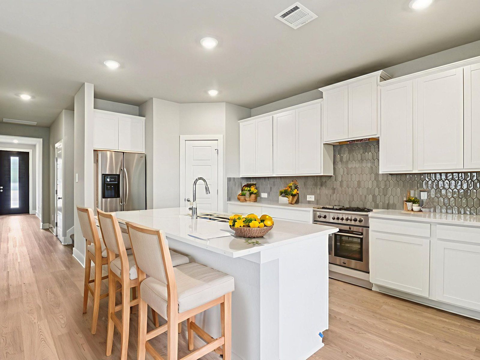 Virtually staged kitchen in the San Jacinto floorplan at a Meritage Homes community.:Virtually Staged Kitchen
