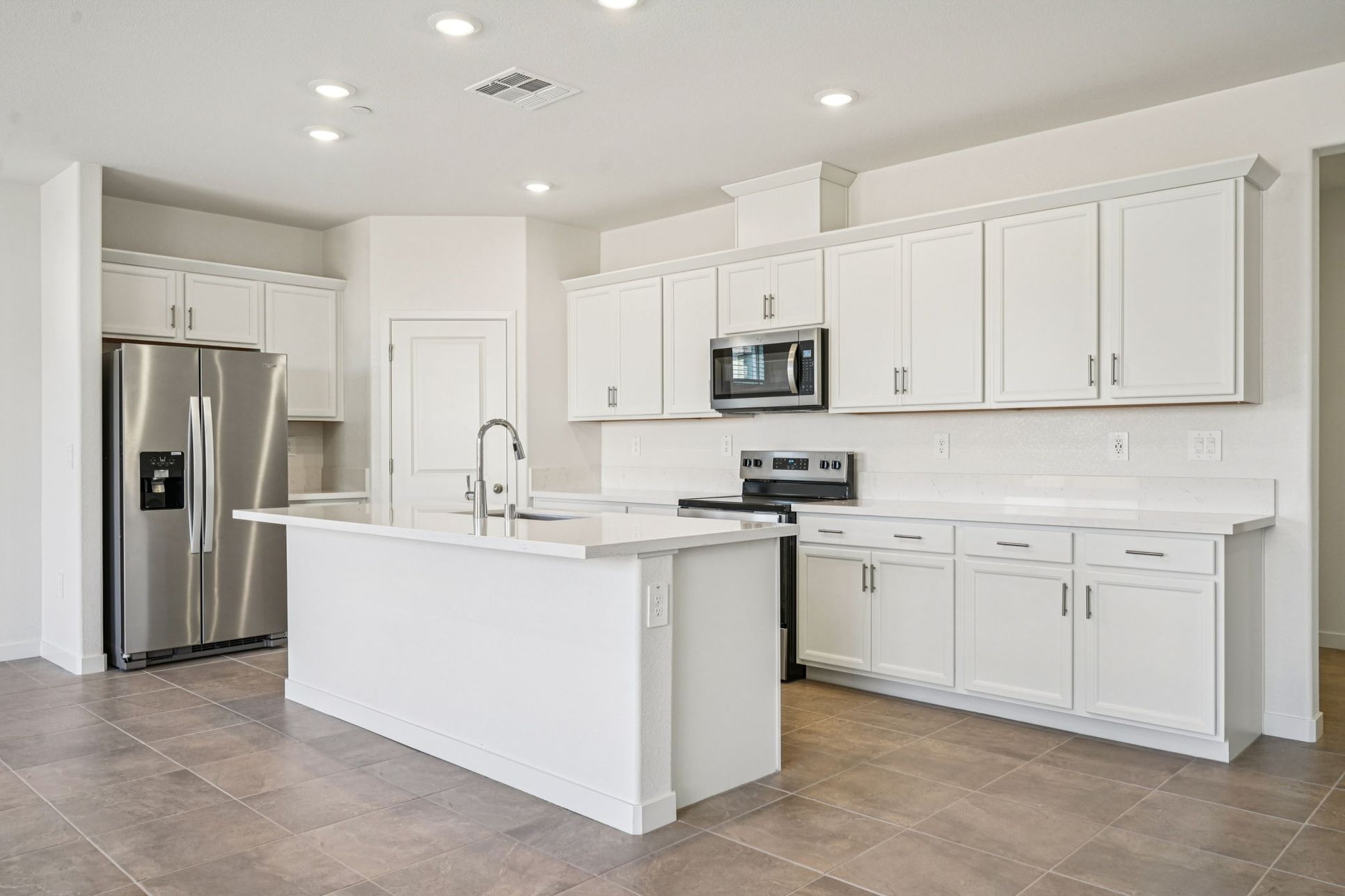 Kitchen:A built plan 4513 at a nearby Meritage Homes Community