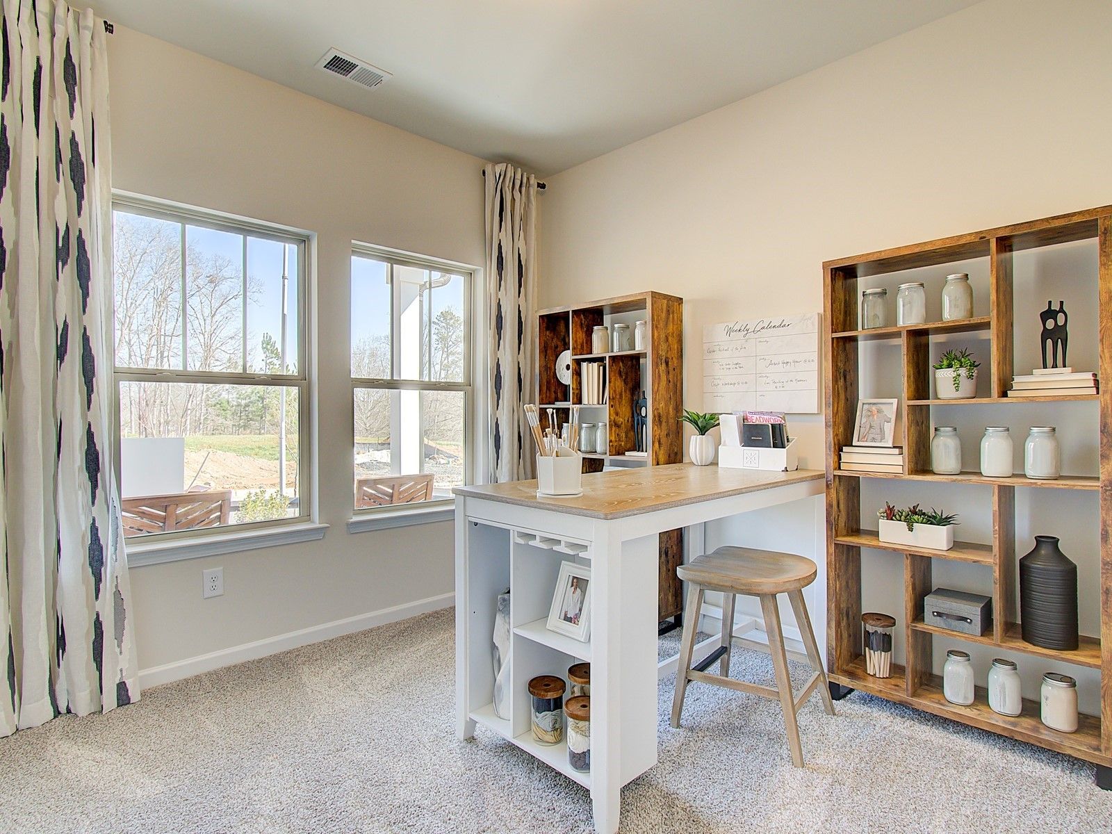 The versatile flex space makes for a great home office or craft room.