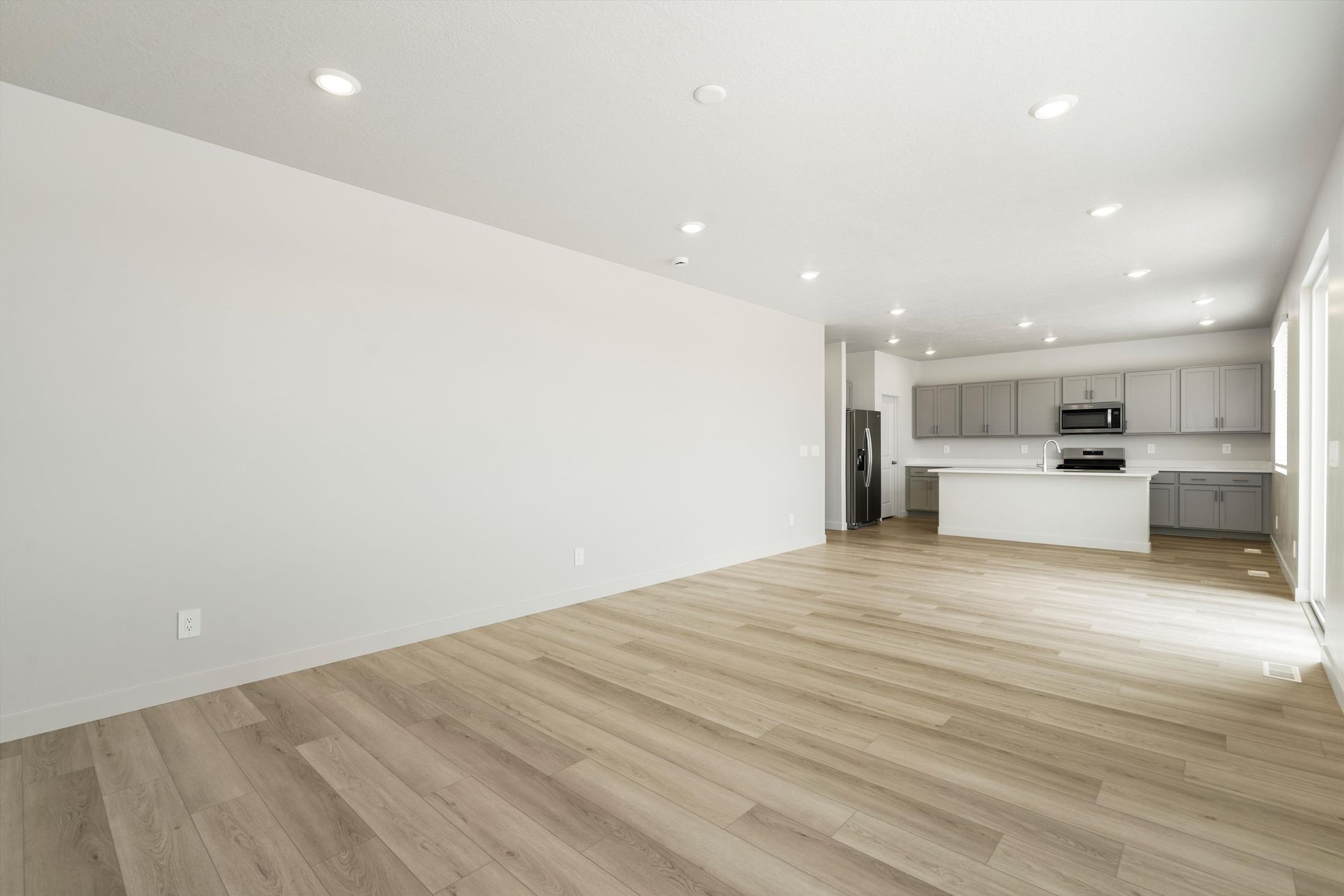 The Residence 4 floorplan interior image taken at a Meritage Homes Community in West Haven, UT.:SLC_Westwood-Residence-4_4211_Living-Area_C_3545-S-3150-W-St-West-Haven-UT.jpg