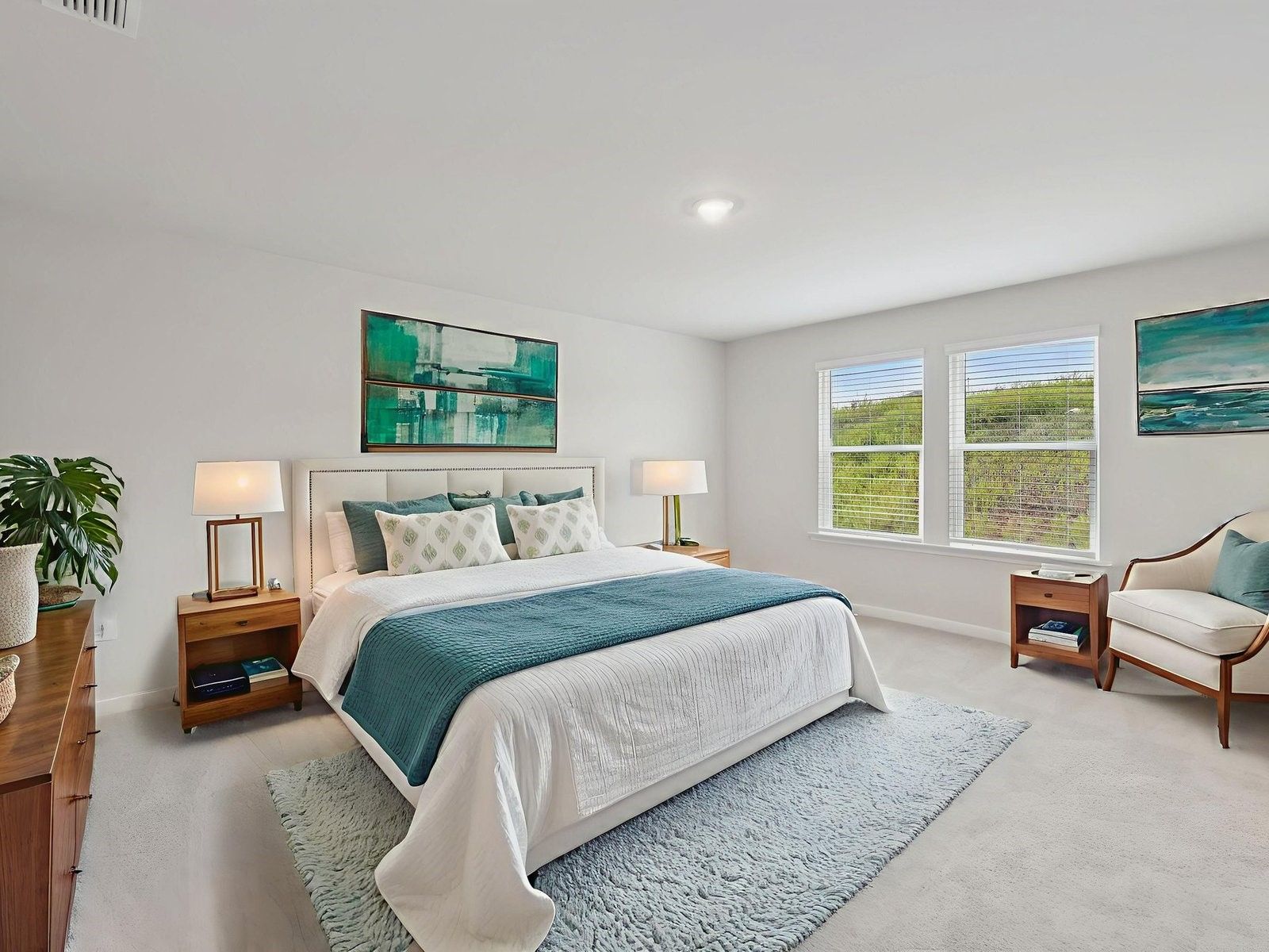 Primary Bedroom:The Brentwood floorplan with the Elemental Linen interior package.