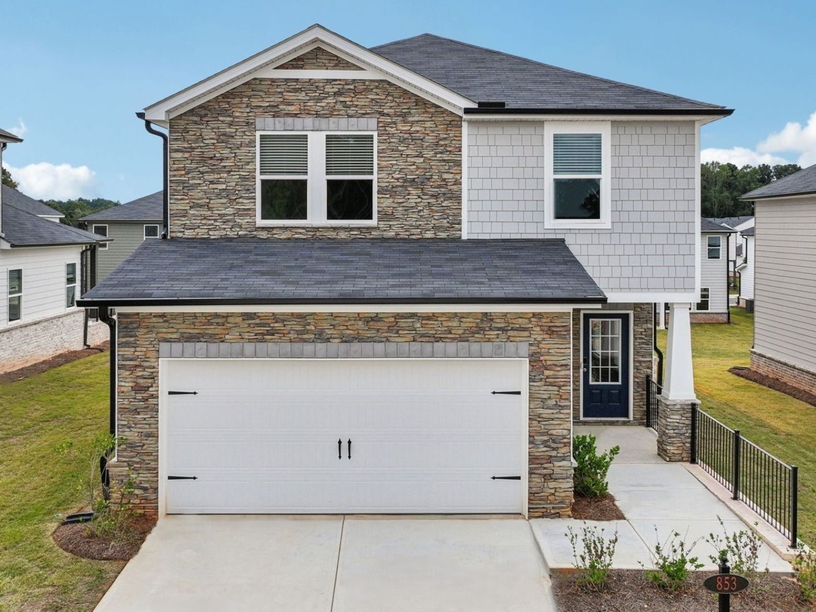 Front Exterior:The Roswell floorplan with Elevation K modeled at Martin Springs.