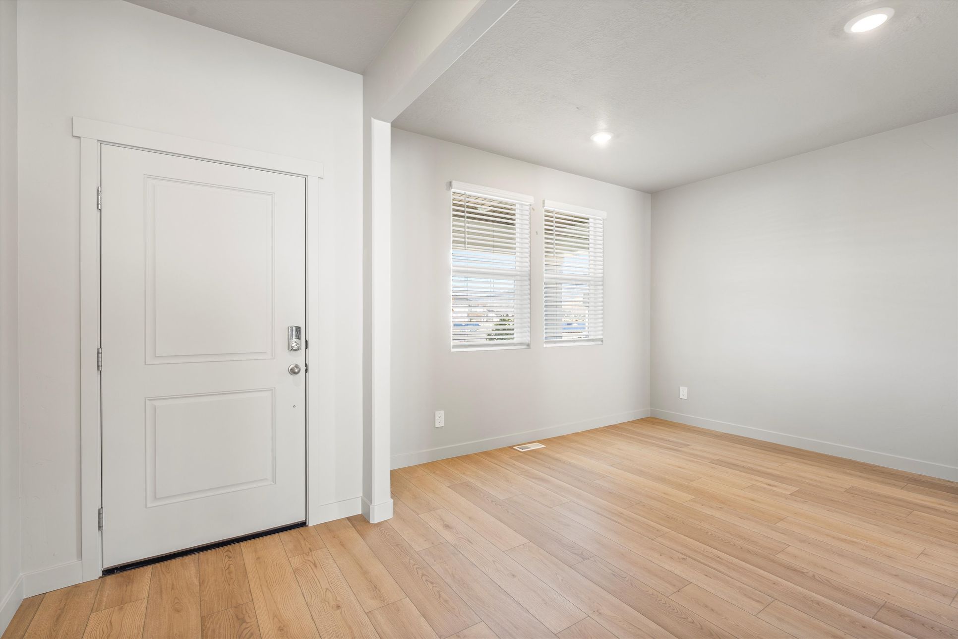 The Willow floorplan interior image taken at a Meritage Homes community in Tooele, UT.:SLC_Willow_#4281_Front-Door_C_1368-Baen-Wy-Tooele-UT.jpg