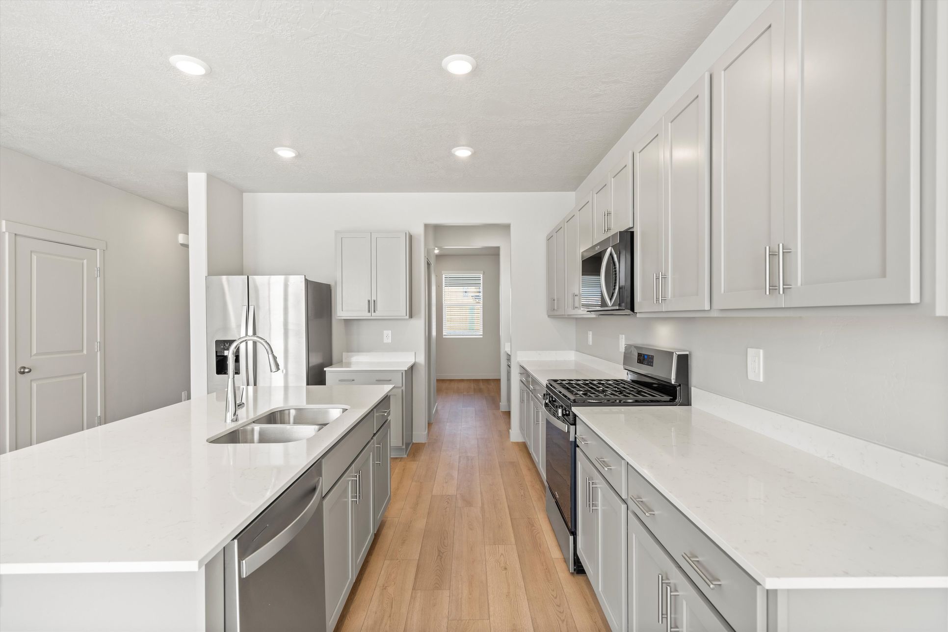 The Willow floorplan interior image taken at a Meritage Homes community in Tooele, UT.:SLC_Willow_#4281_Kitchen_C_1368-Baen-Wy-Tooele-UT.jpg