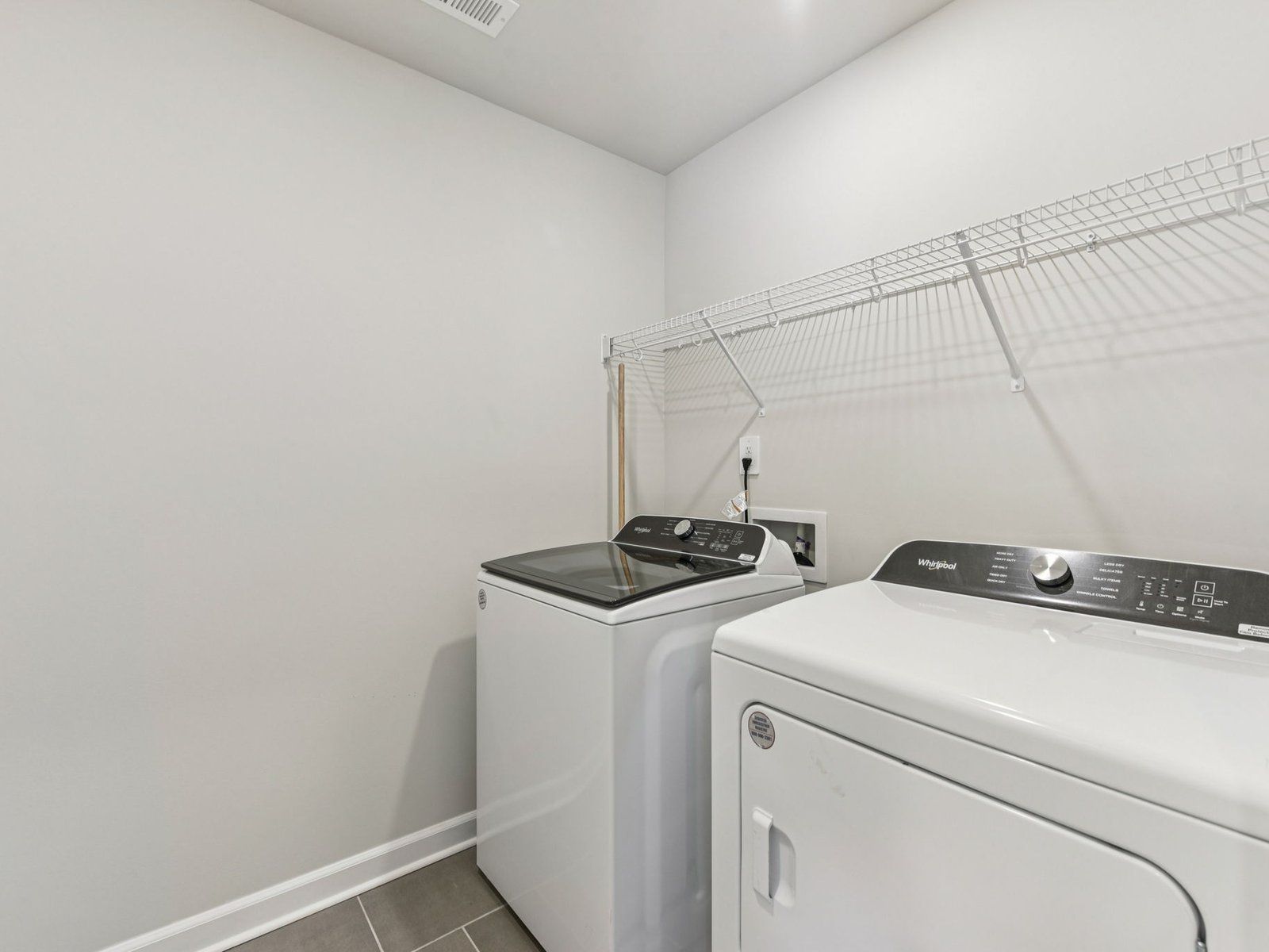 Laundry day just got easier with more room to store and organize your cleaning essentials.:Laundry Room