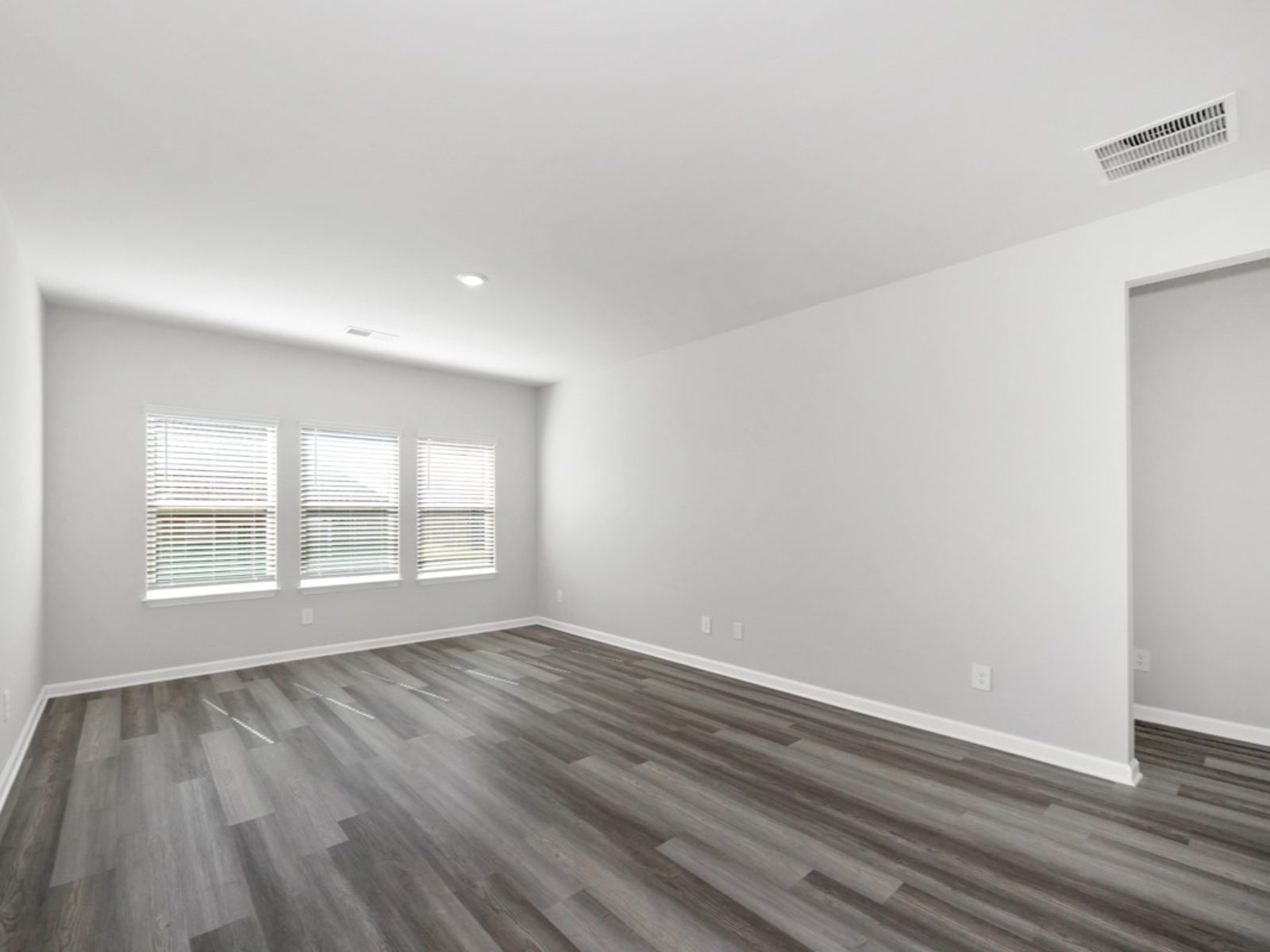 The Newport floorplan with the Crisp White interior package.:Great Room
