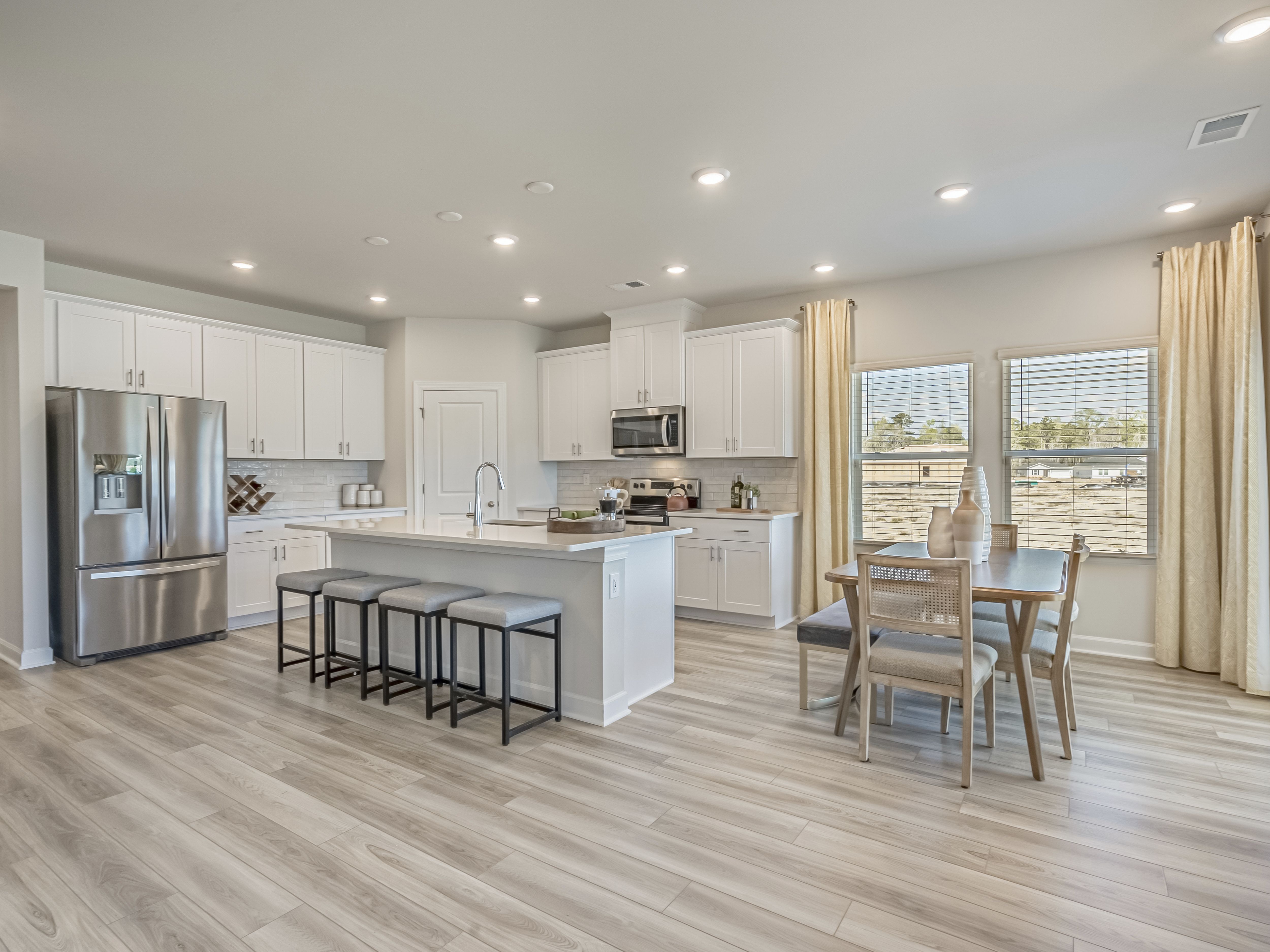 Dining Area:Newport floorplan modeled at another Meritage Homes® community.